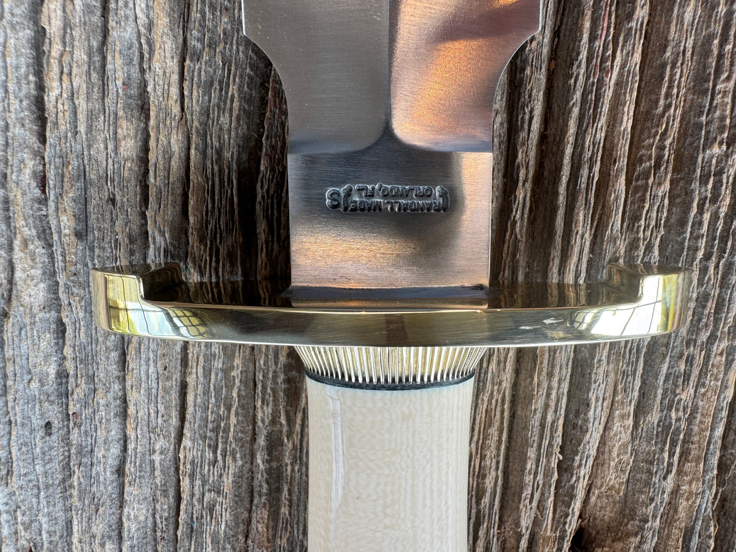 New in paper Randall Clinton Special with a nice piece of customer supplied Warthers Resin with concave grip, Stainless Steel, Brass Lugged Hilt and brass scalloped coolie cap.