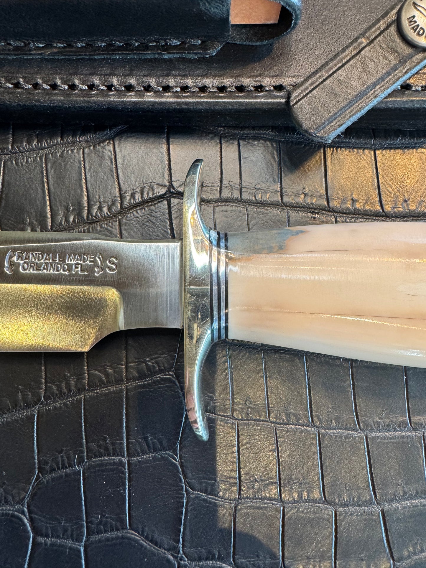 Randall Model 1-7 in Creamy Fossil Walrus Ivory. Nickel Silver Hilt and Aluminum Flanged Butt cap. ( slight crack)