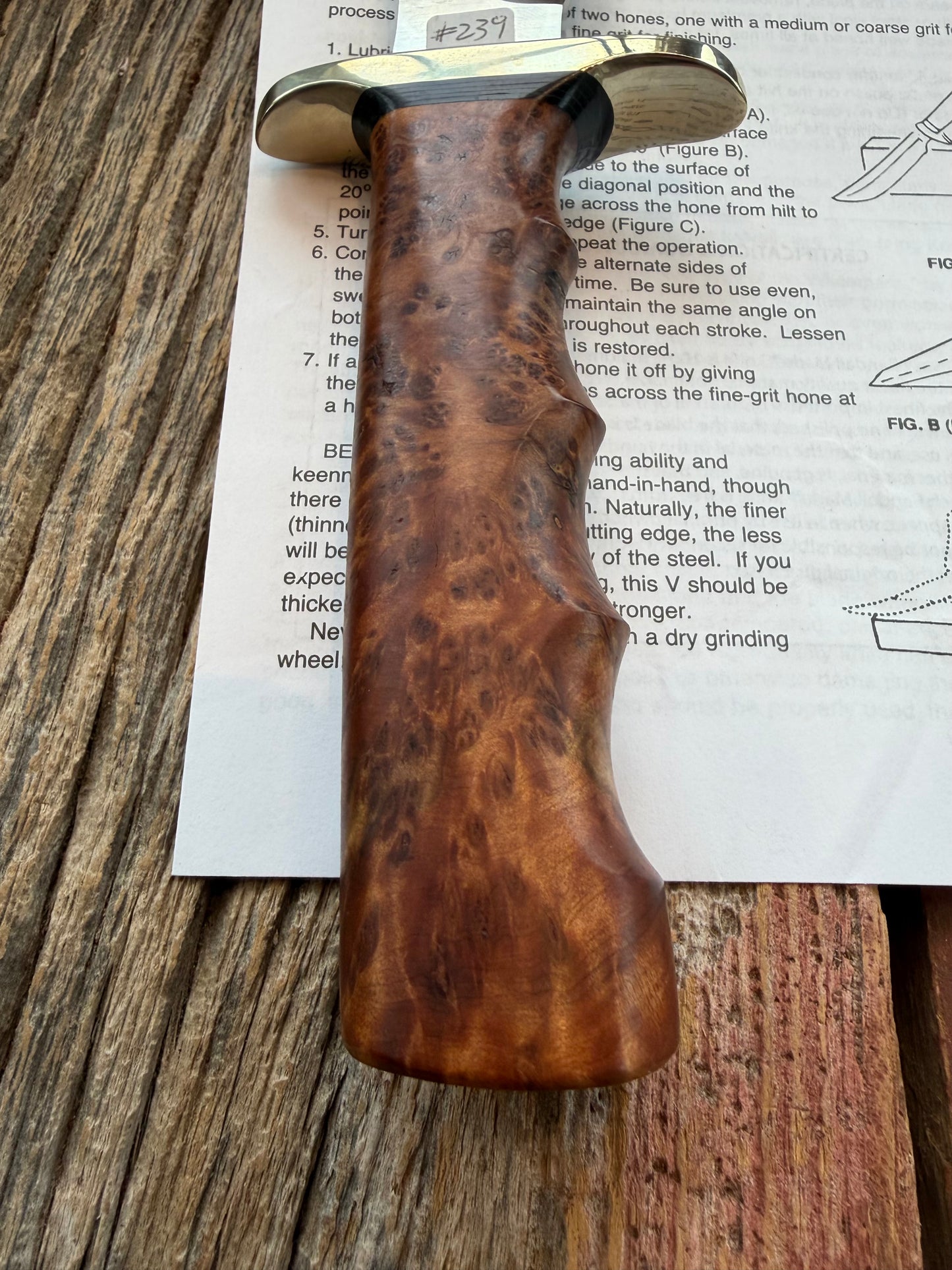 New in Paper Randall Made Knife Model 1-8 in Thuya wood. Stainless, single Black spacer, Sawteeth, Nickel Hilt.
