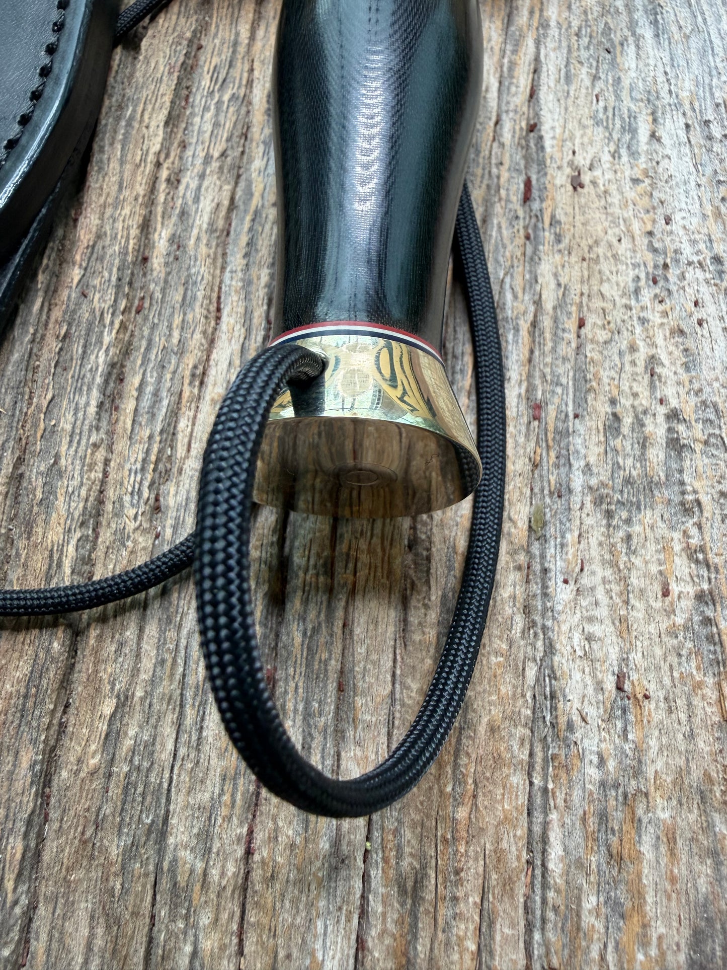 Nice Randall Model 12-9 in black Micarta handle. Red white and Blue spacers, Double Nickel Silver hilt, aluminum butt cap. Stainless blade.
