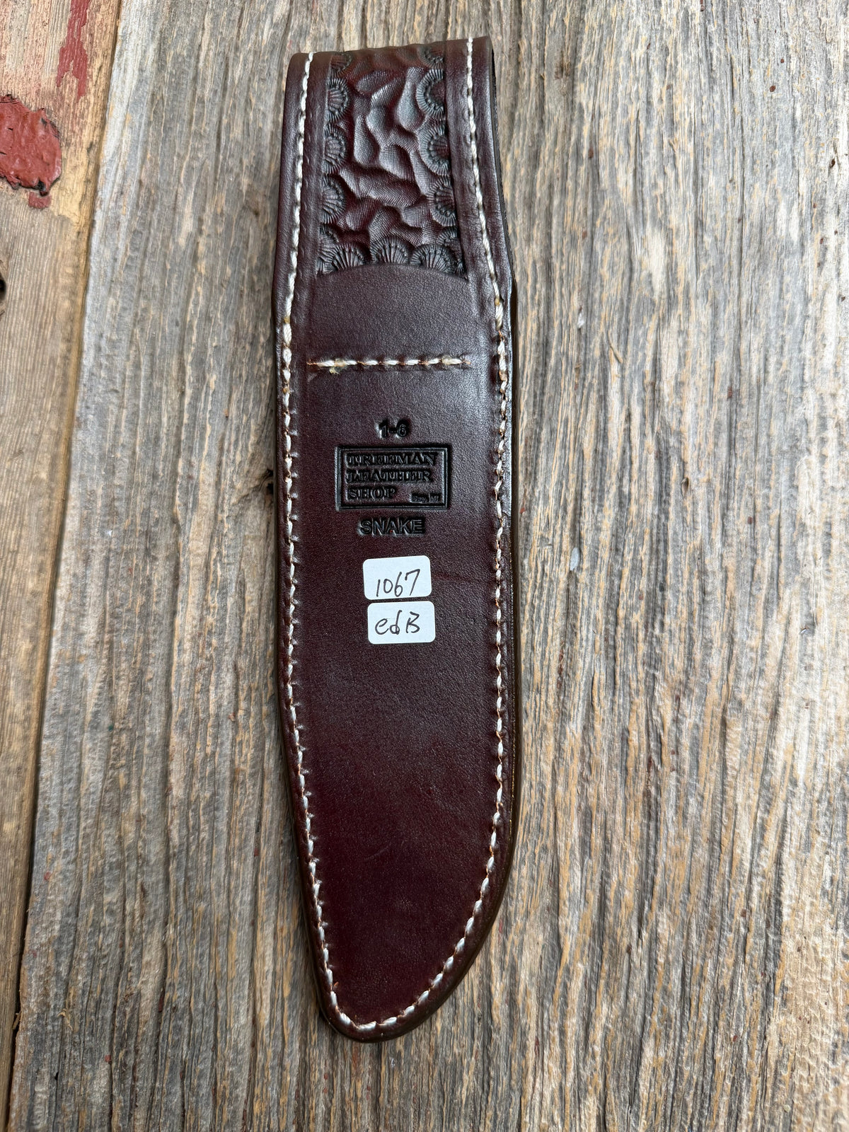 Randall Model 1-6 sheath with an Eastern Diamondback RattleSnake skin from Treeman Sheaths. Hand tooled belt loop, canteen snap. Vibrant colors and one of the hardest skins to source.