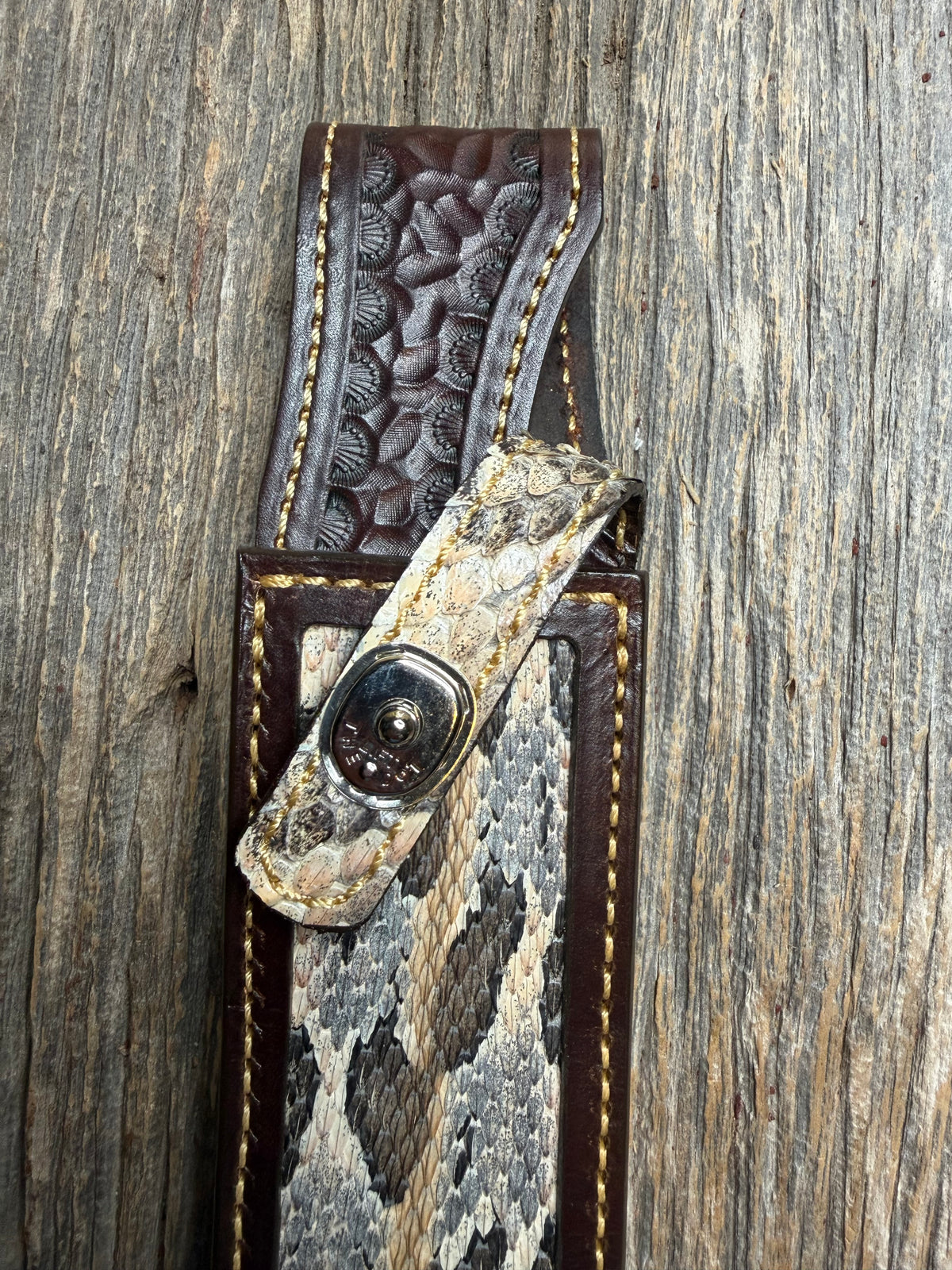 Randall Model 1-8 sheath with a Canebrake RattleSnake skin from Treeman Sheaths. Vibrant colors and along side Copperheads the hardest skin to source.