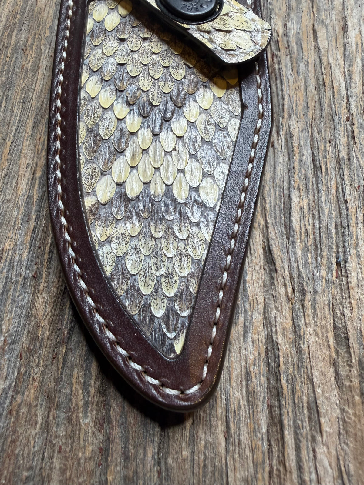 Randall Model 19-5 sheath with an Eastern Diamondback RattleSnake skin from Treeman Sheaths. Hand tooled belt loop, canteen snap. One the hardest skins to source.