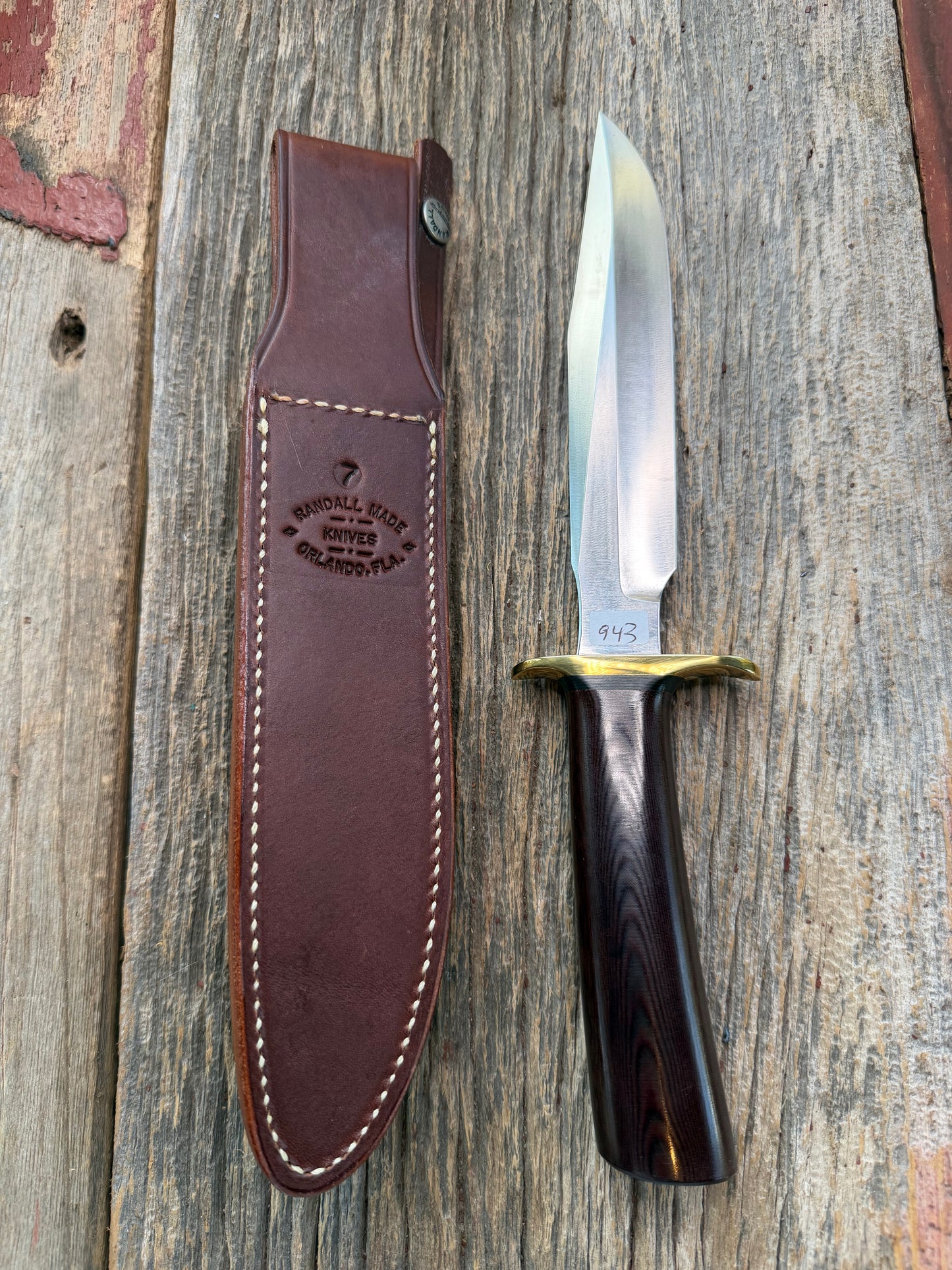 New in Paper Randall Model 1-7 Maroon Micarta Brass Hilt, Natural end, single black spacer, carbon steel.