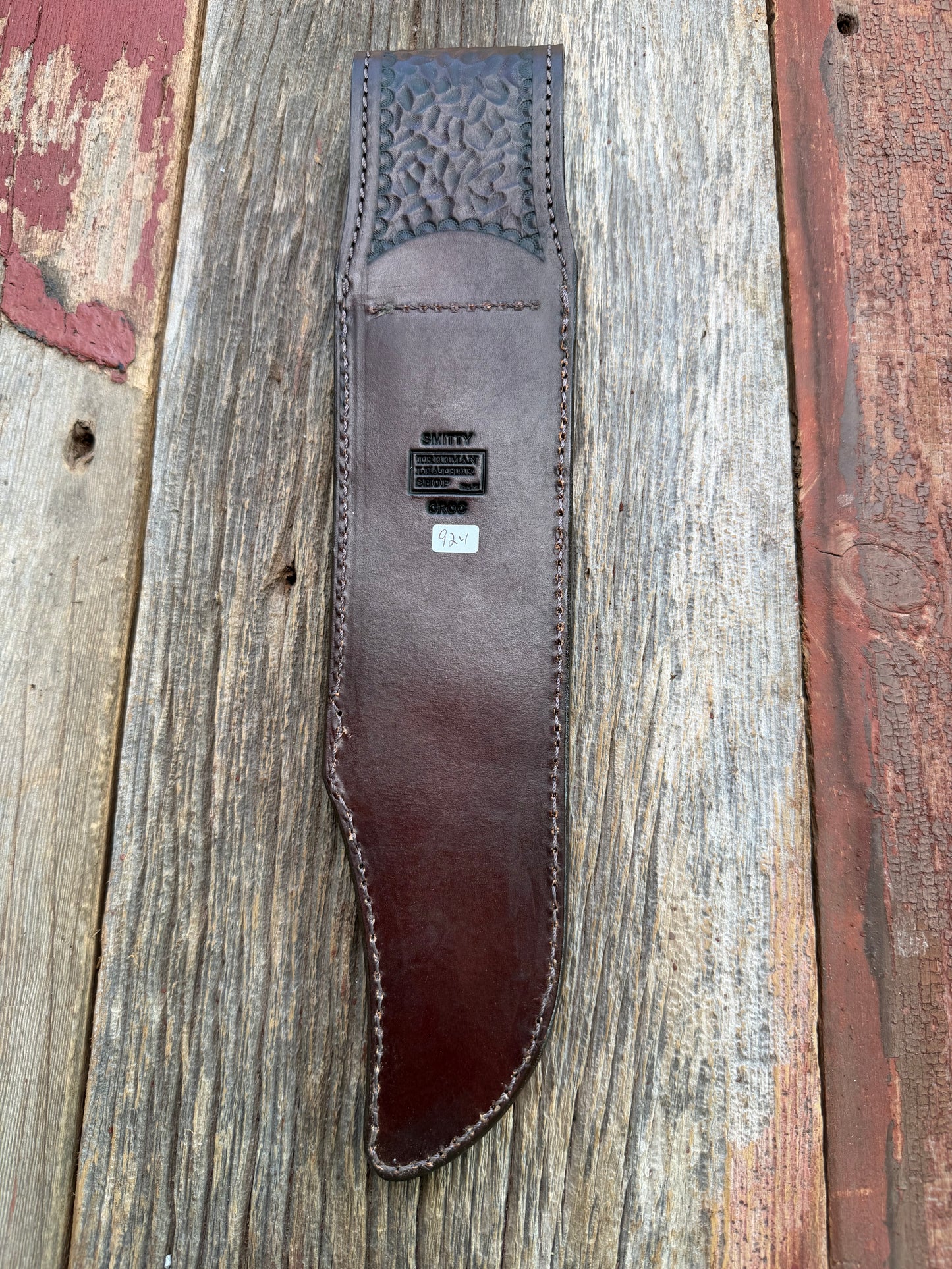New Randall Model 12-11 Smitty Sheath in Exotic Chocolate Brown Matte Crocodile (Hornback and Skull) from Treeman with the newest Black Canteen snap. Killer sheath.