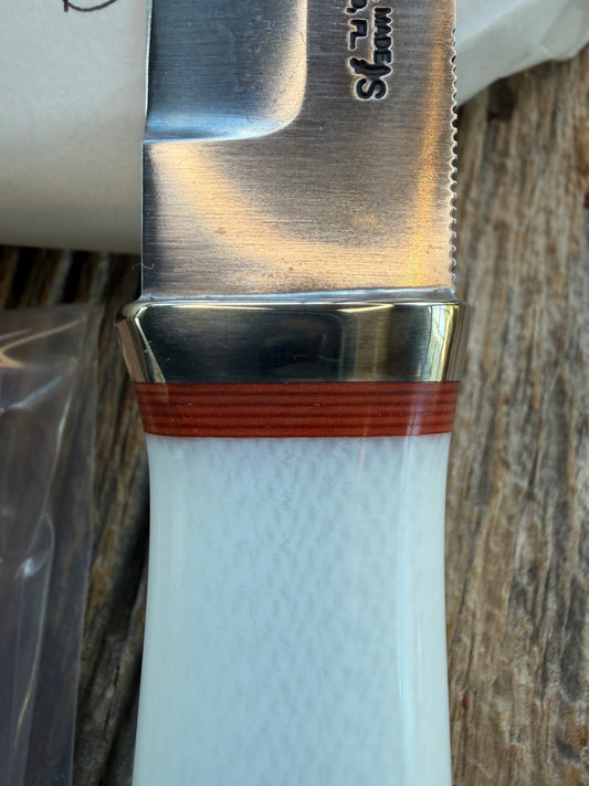 New in Paper Randall Model “Gambler” 4 Inch in Ivorite Nickel hilt, Stainless, red single spacer.