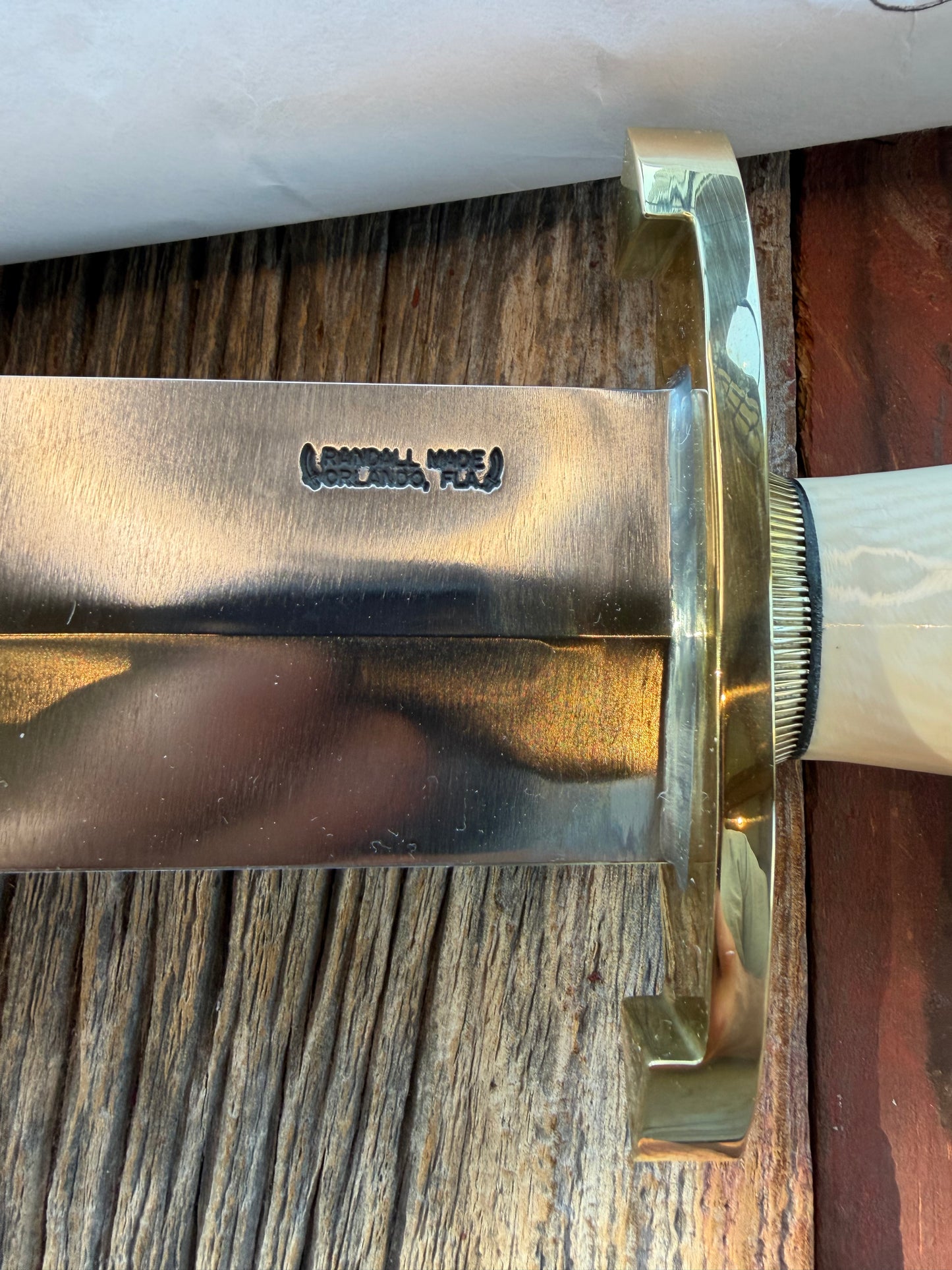 New in Paper Model 12-11 Smithsonian “ Smitty” Beautiful Dave Warthers Resin with a Brass Lugged hilt and Scalloped brass collar and scalloped coolie butt cap.