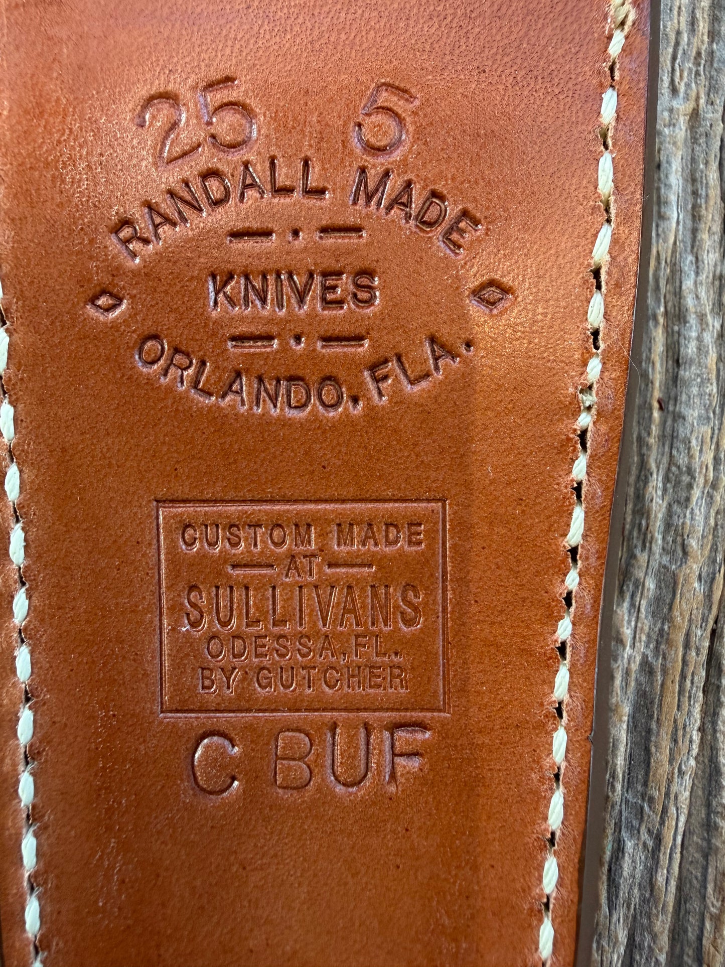 New Randall Model 25-5 Sheath in Exotic Brown Cape Buffalo with full leather hand tooled belt loop. Randall snap and stamp on the back. Custom Made at Sullivan’s by Gutcher