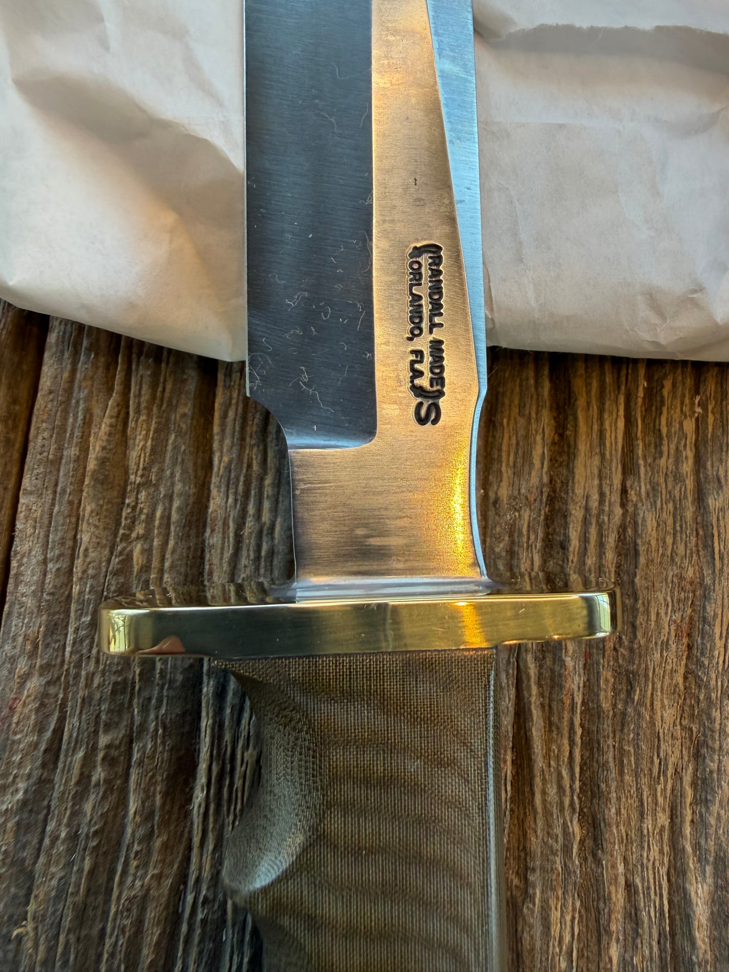 New in Paper Randall Model 16 SP#1 Special fighter with a Green Micarta handle. SS blade, Nickel silver hilt. Lanyard. Brown leather sheath.