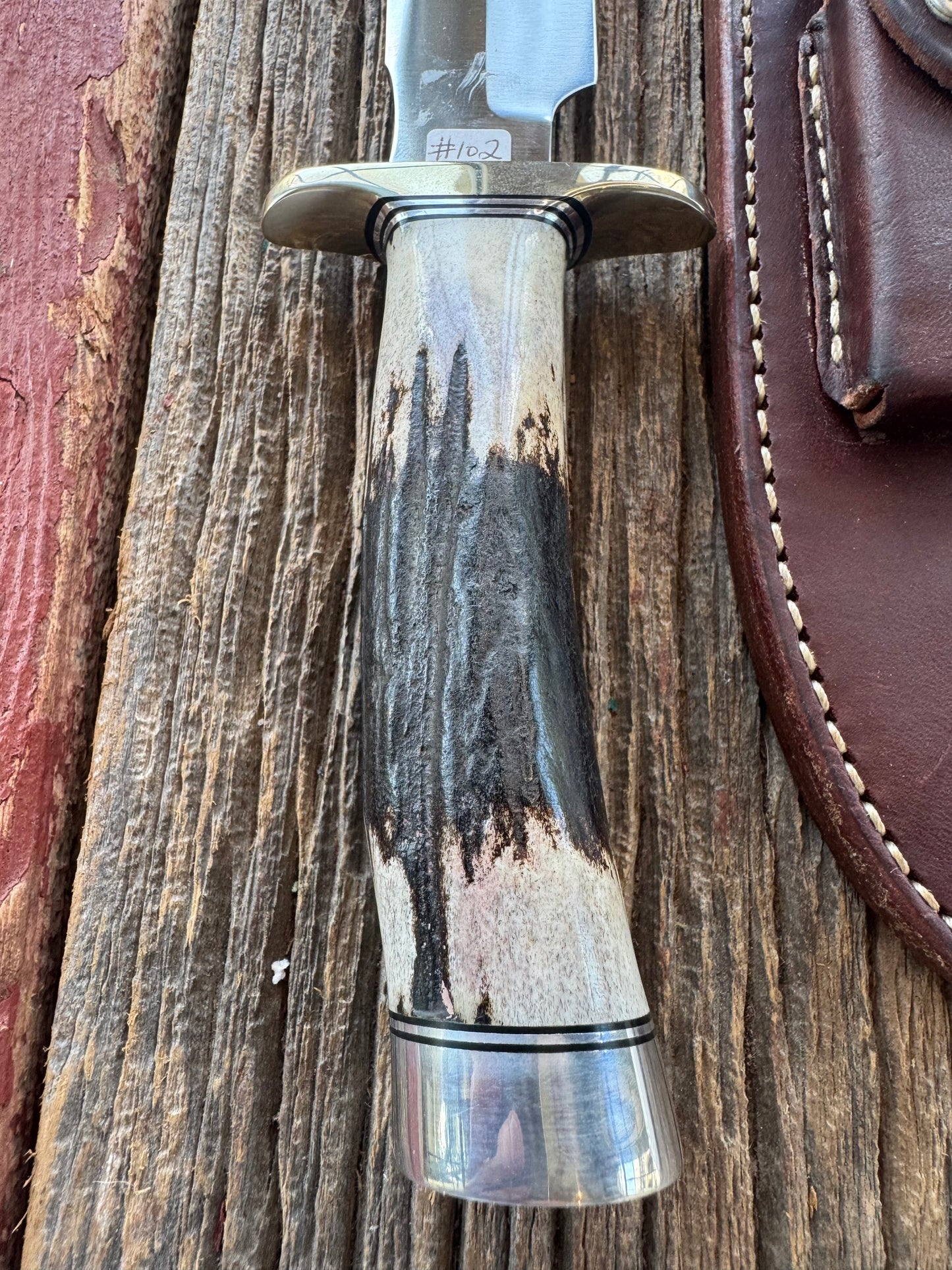 New in paper Randall Model 1-8 with shop Stag. Nickel silver Hilt and Aluminum Butt cap.