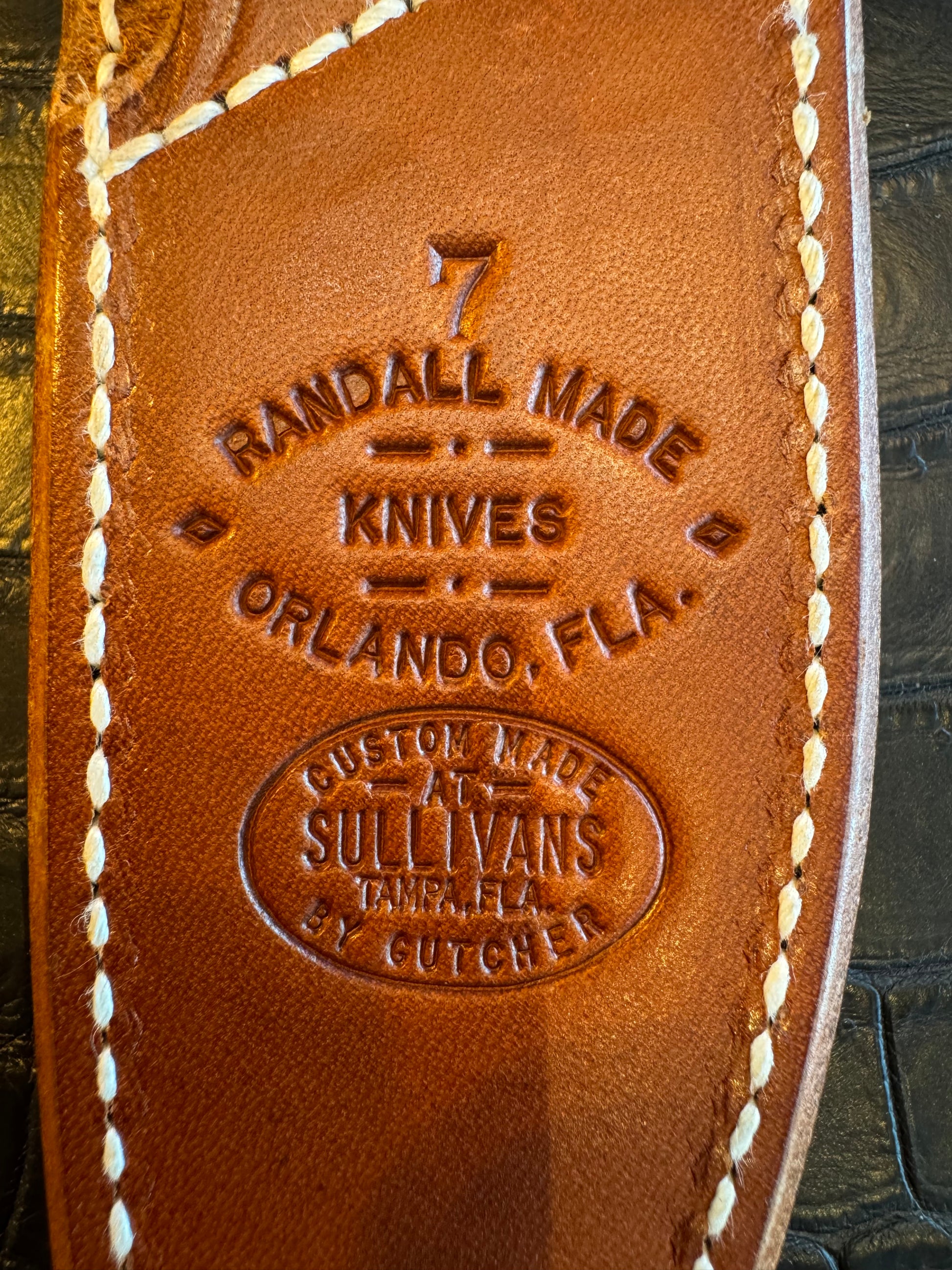 Randall Model 1-7 or 2-7 Exotic Snake skin in a low rise or high boy Sheath from Sullivans by Gutcher.
