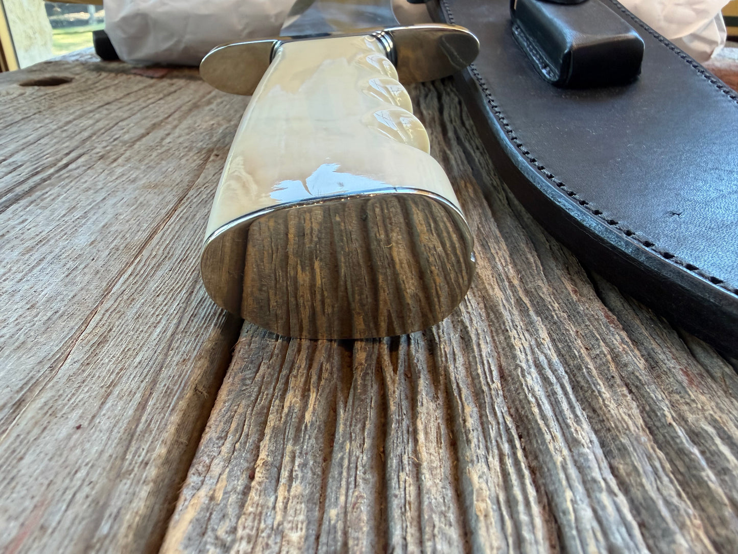 New in Paper Randall Model 12-11 Dealer Special Large Sasquatch Huge piece of Pearly White Fossil walrus Ivory, Finger Groves , # 1134 Nickel Silver Hilt and butt cap.