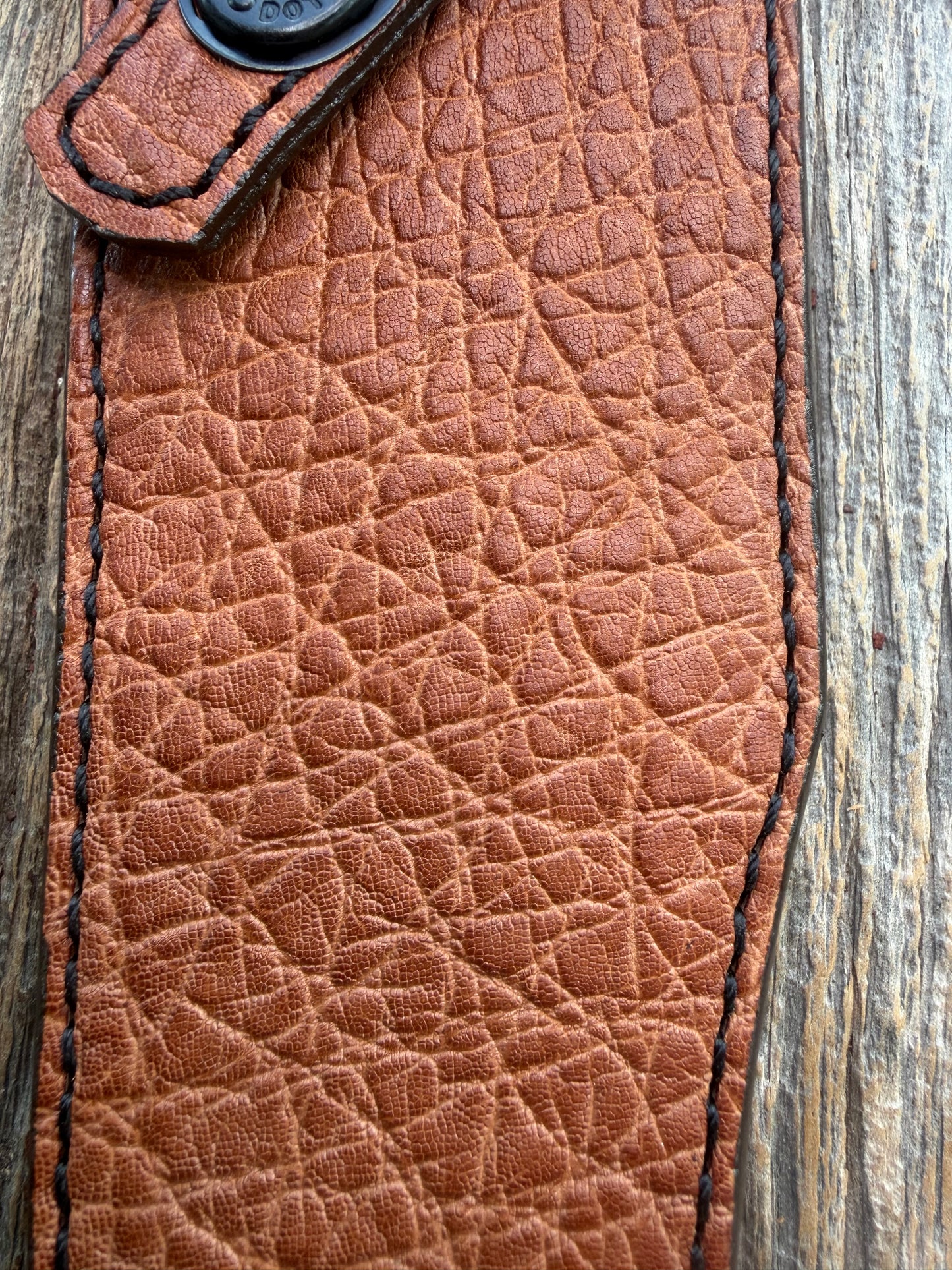 New Randall Model 12-8 Big Bear Sheath in Exotic thick and textured Rust colored Elephant hide on brown leather from Treeman with a black Canteen snap. Hand tooled belt loop. Killer sheath.