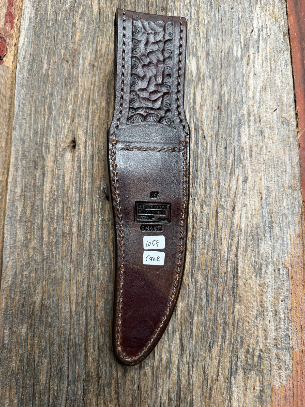 Randall Model 27 sheath with a Canebrake RattleSnake skin from Treeman Sheaths. Vibrant colors and along side Copperheads the hardest skin to source.