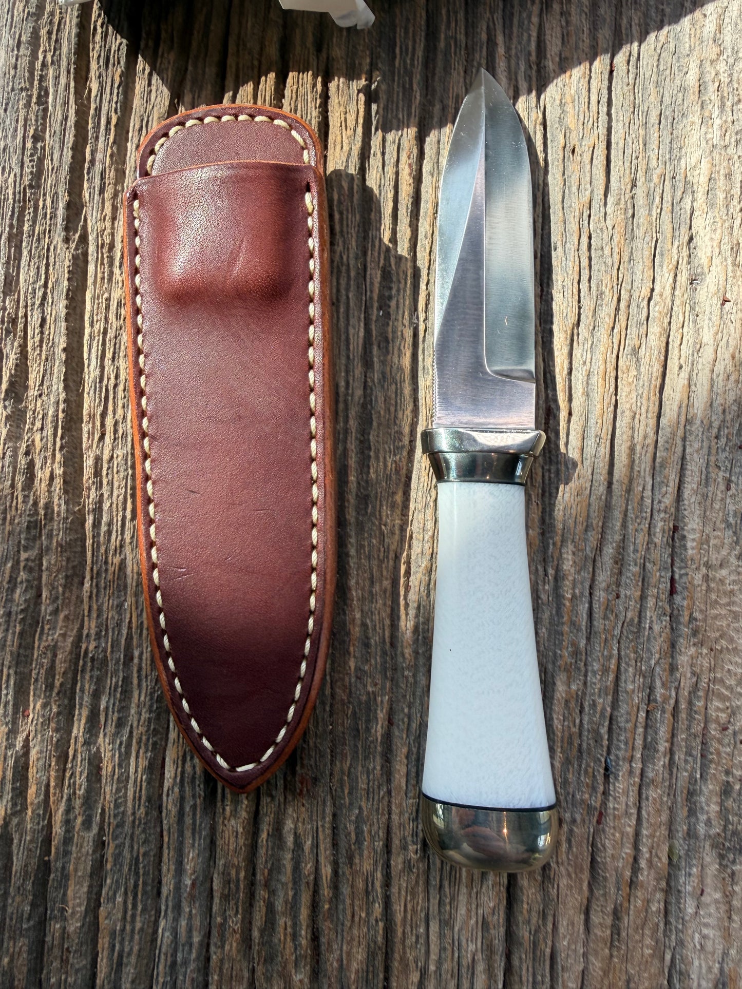 New in Paper Randall Model “Gambler” 4 Inch in Ivorite handle, Nickel hilt, Stainless steel blade, Nickel silver collar , rounded nickel silver butt cap.