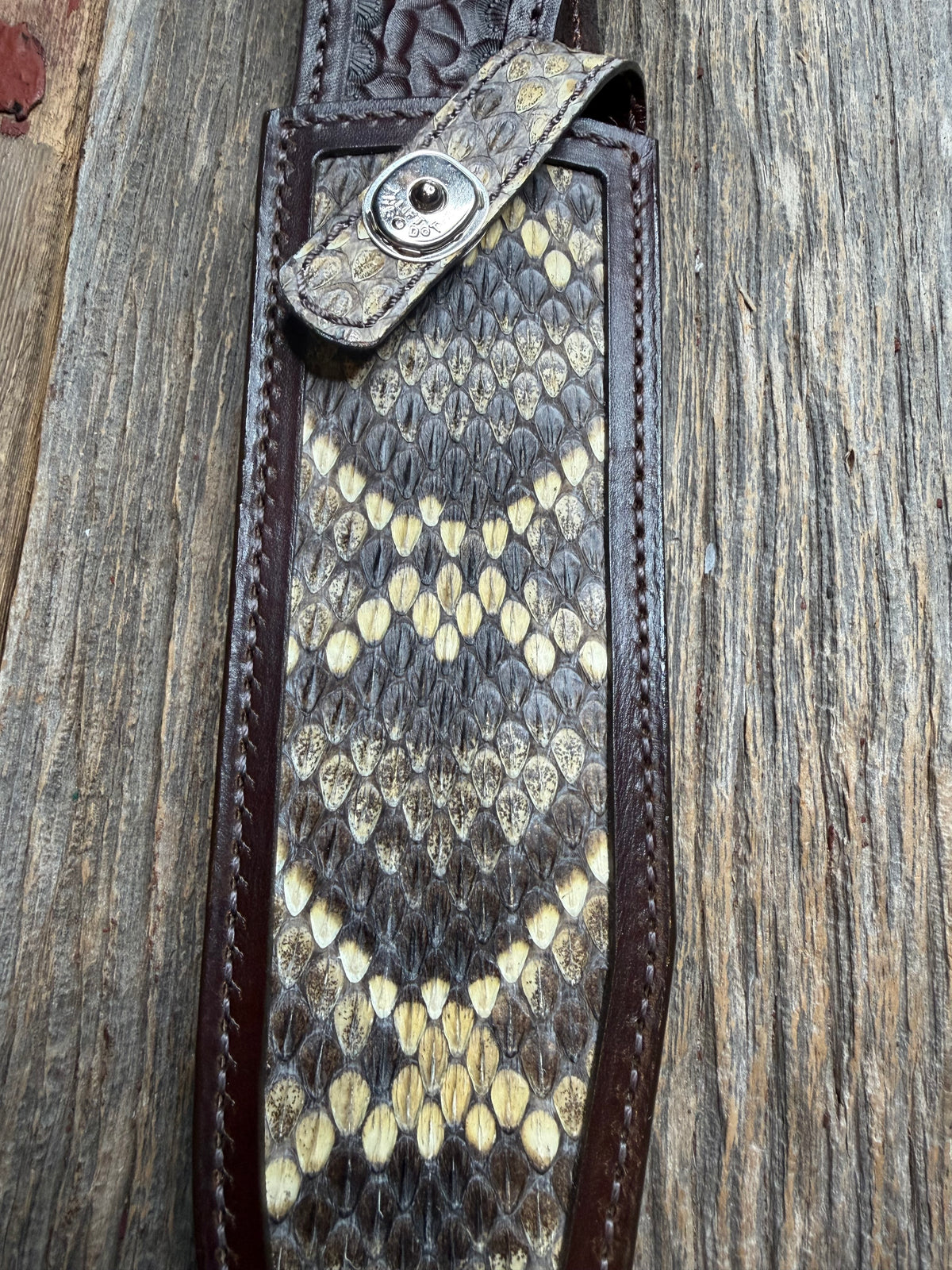 Randall Model 12-9 sheath with an Eastern Diamondback RattleSnake skin from Treeman Sheaths. Hand tooled belt loop, canteen snap. Vibrant colors and one of the hardest skins to source.