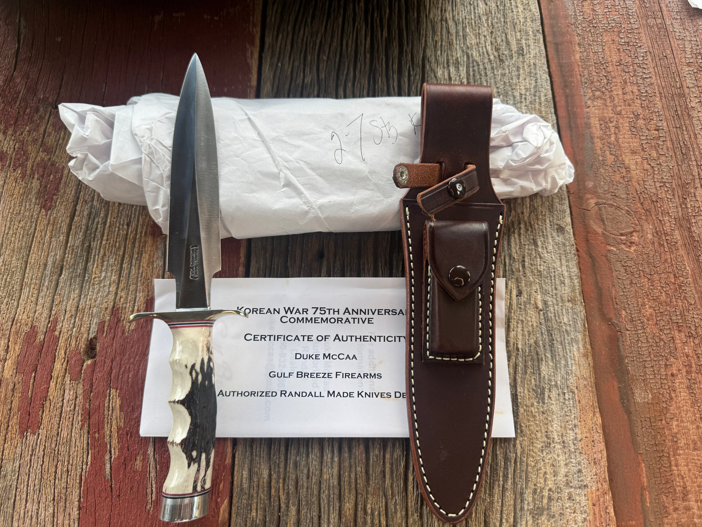 New in Paper Randall Knife Model 2-7 Korean War Commemorative 1 of 50 made Stag with finger grooves.