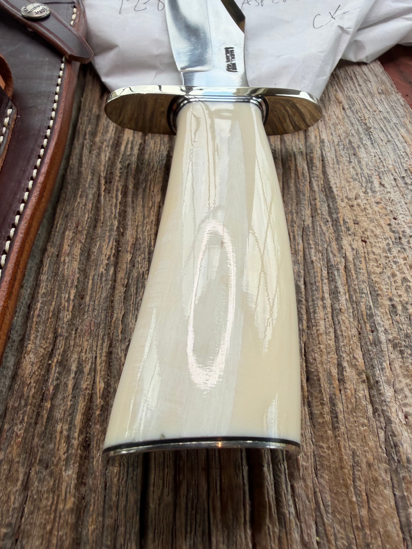 New in paper fresh from the Shop. Randall Knife Model 12-8 Big Bear. Gorgeous piece of creamy Fossil Walrus Ivory. Nickel silver hilt and plate end, Carbon  steel.
