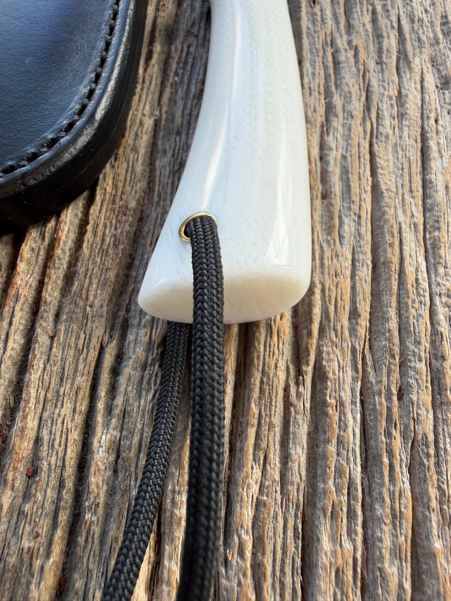 New in Paper Randall Non Catalog Model  Cattleman. White Ivorite handle. Red and silver spacers. Stainless blade.