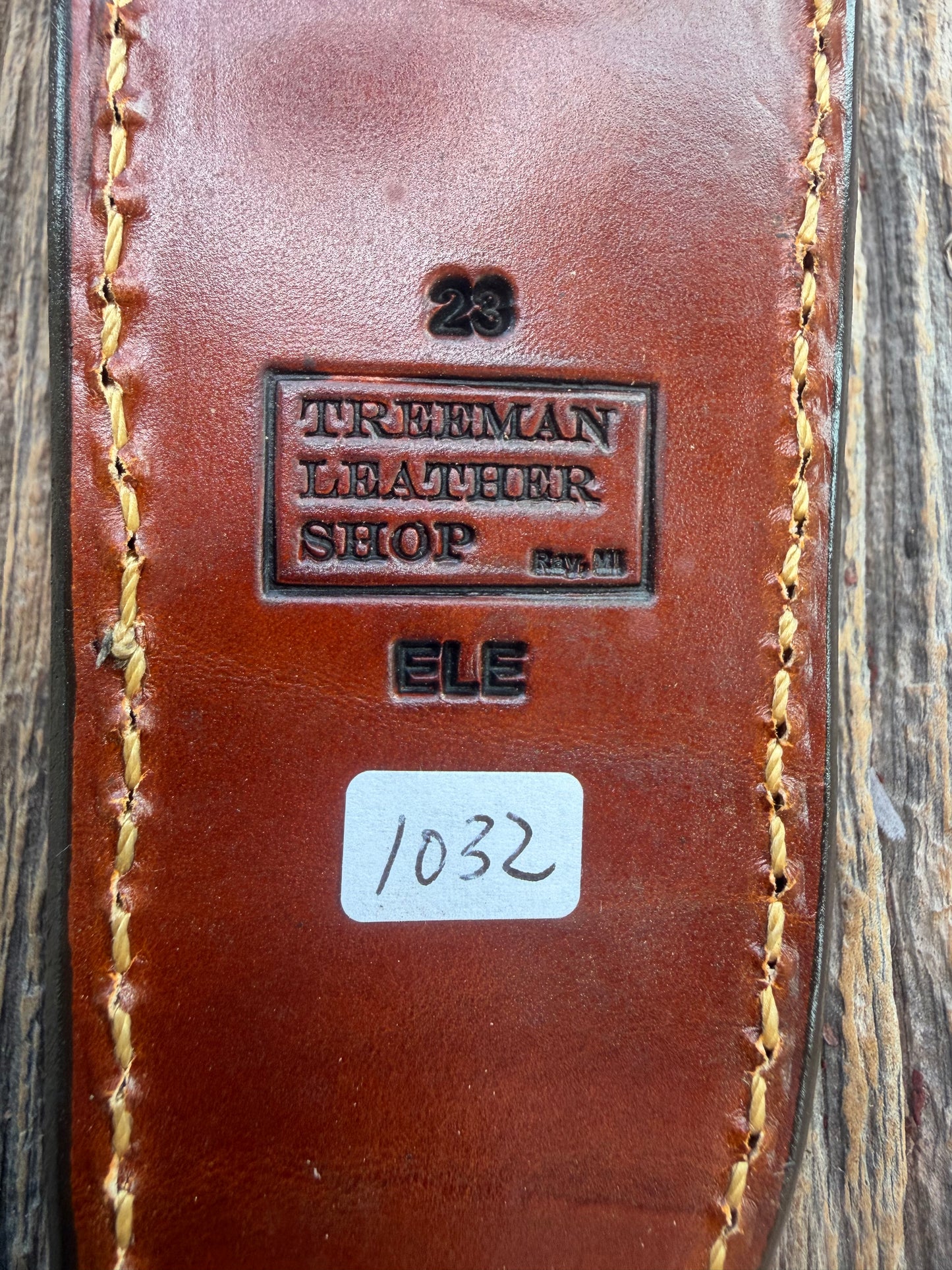 New Randall Model 23 Sheath in Exotic thick and textured Rust colored Elephant hide on brown leather from Treeman with a silver Canteen snap. Hand tooled belt loop. Killer sheath.
