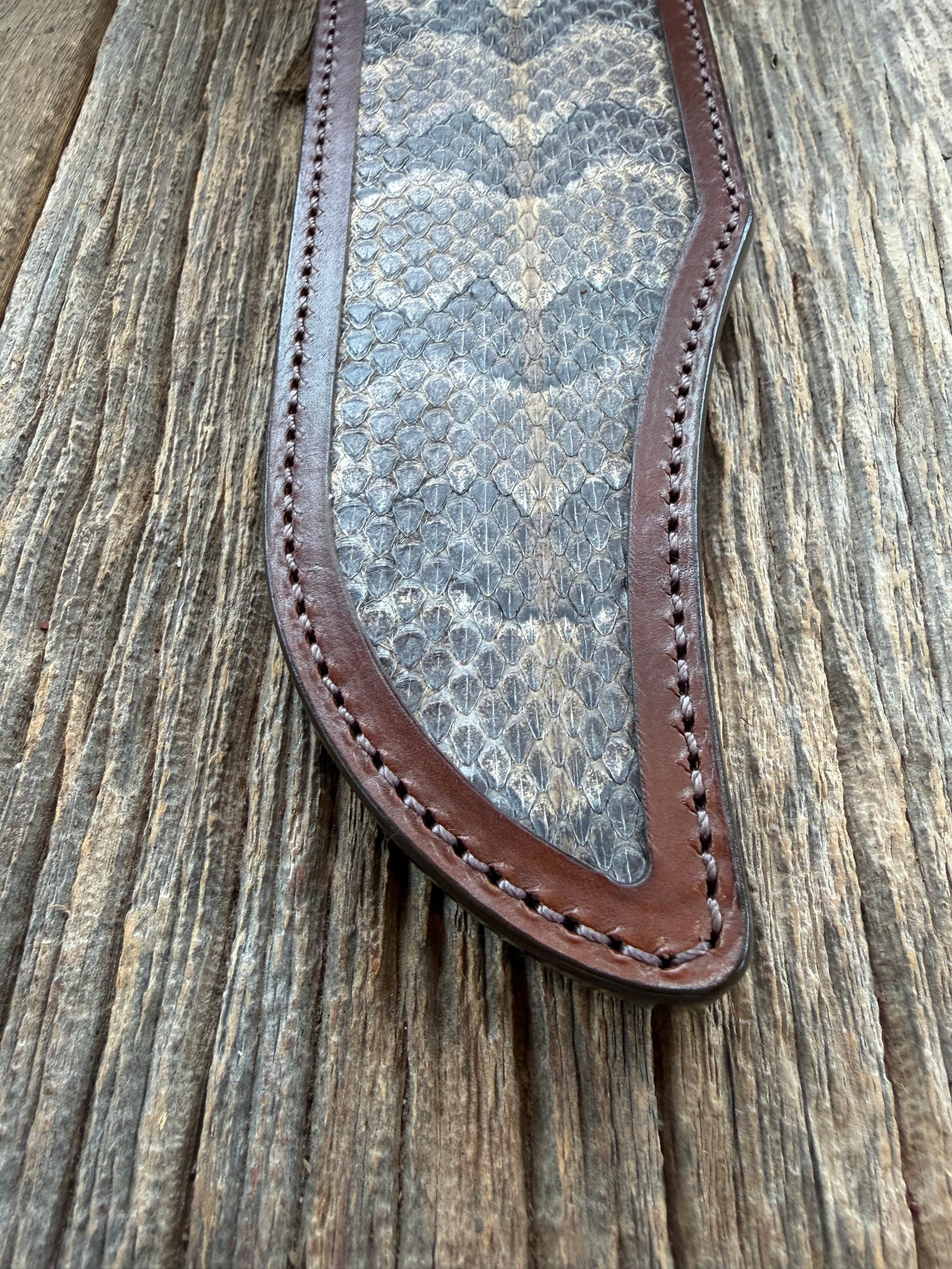 Randall Model 12-11 Smitty Sheath in Exotic Canebreak RattleSnake with the original Rattles tail made into the strap. An absolute gem 1/1 from Treeman Sheaths. Tremendous colors on this one.