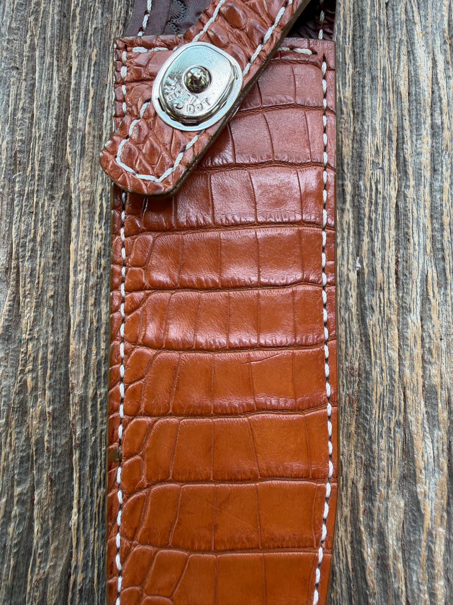 New Randall Model 1-7 Sheath in Exotic thick and textured Honey Crocodile skin on brown leather from Treeman with a silver Canteen snap. Hand tooled belt loop. Killer sheath.