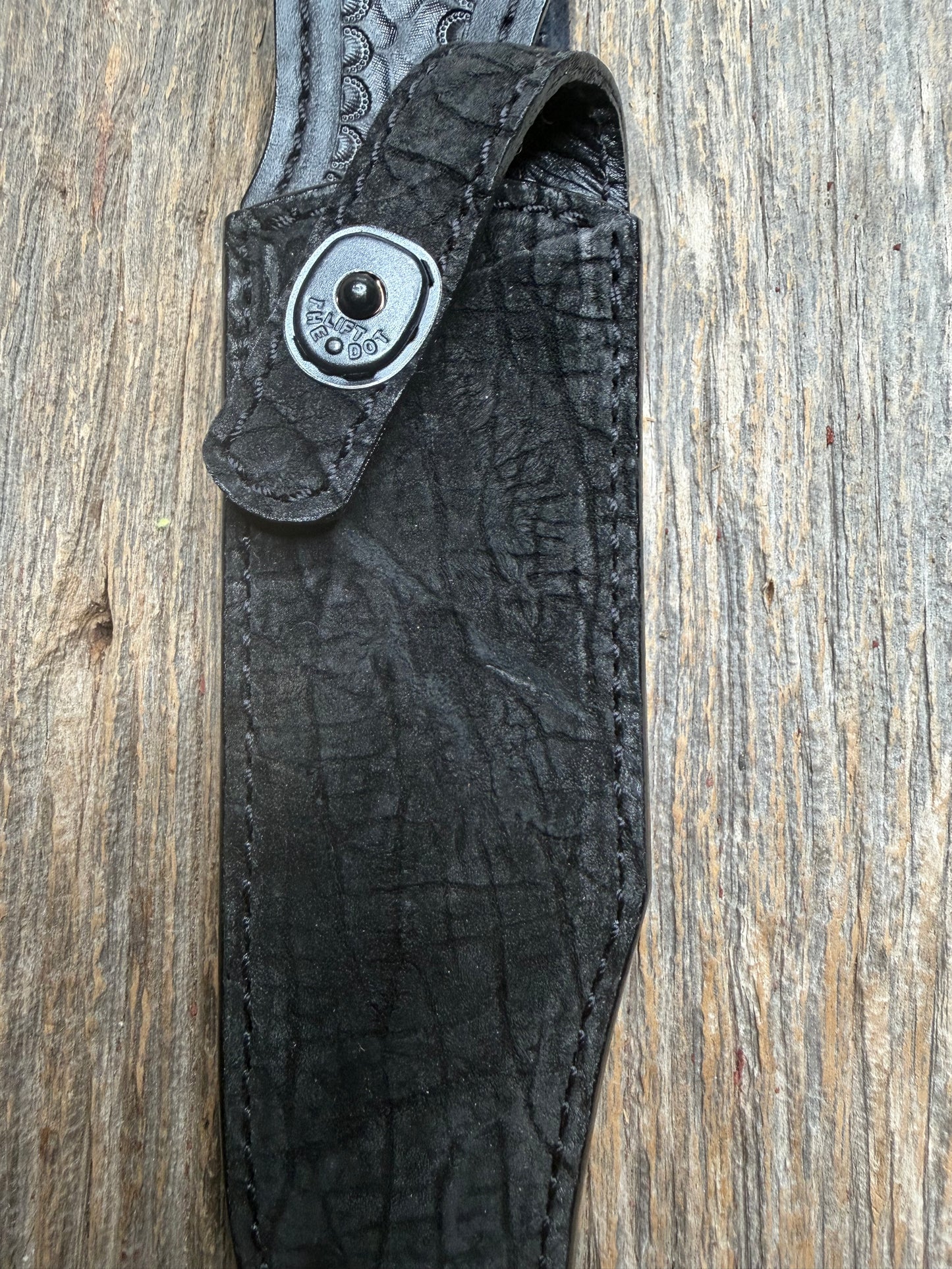 Randall Model Buxton Fighter in Black Hippo, forward curved hilt, black Canteen Snap, full brass stamping and stitching.