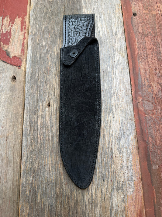 Randall Model 12-11 Large Sasquatch in Black Hippo, forward curved hilt, black Canteen Snap, full brass stamping and stitching.