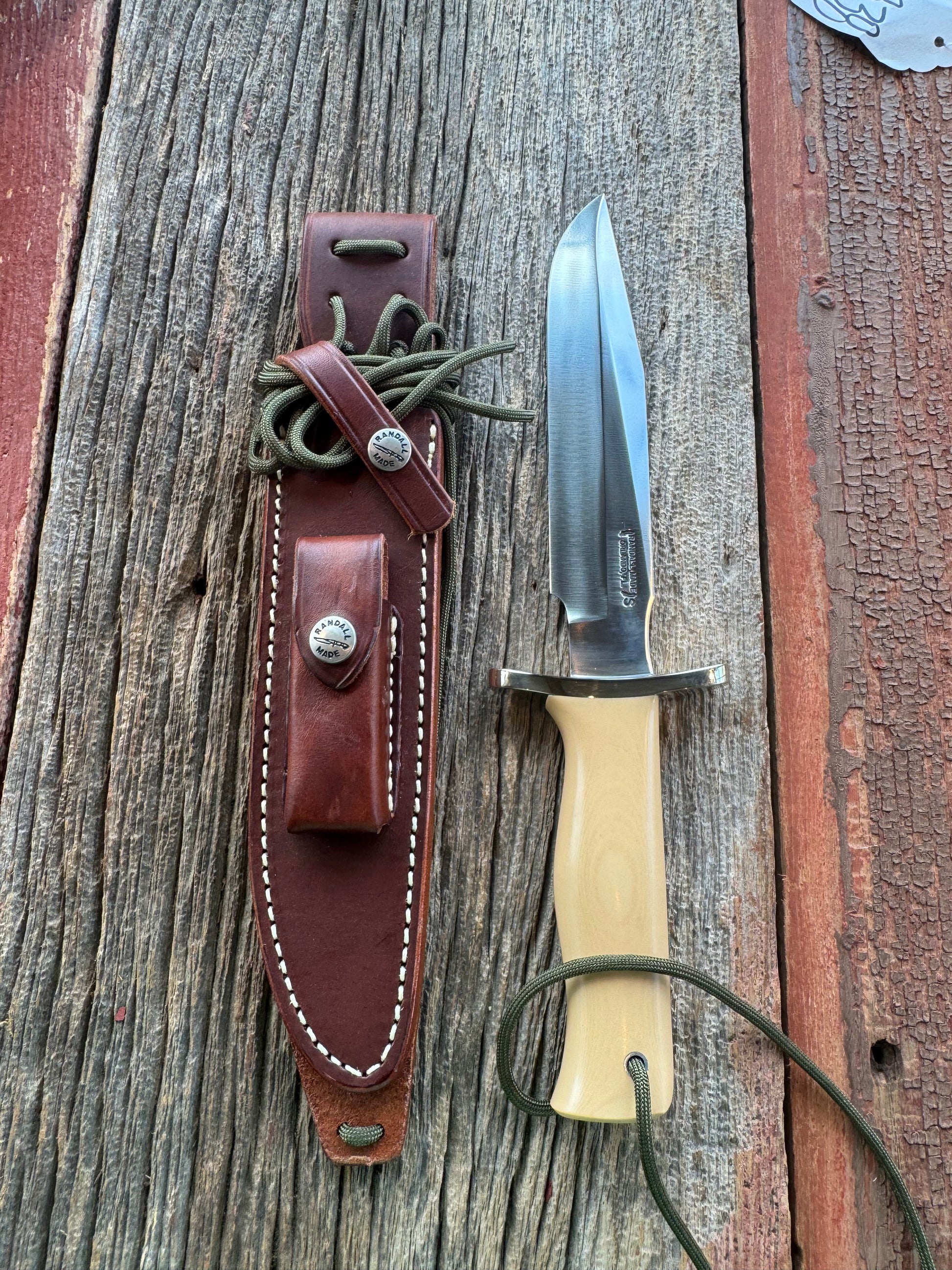 Randall Model 16-7 in Tan Micarta. Nickel Silver Hilt, Stainless steel and Lanyard. New in Paper.