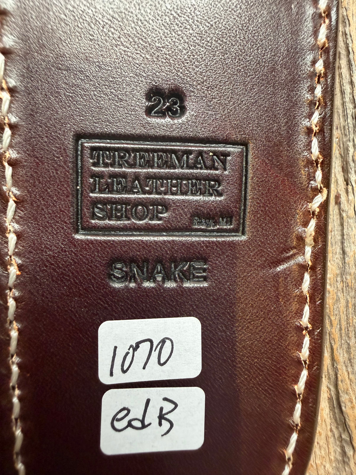 Randall Model 23 sheath with an Eastern Diamondback RattleSnake skin from Treeman Sheaths. Hand tooled belt loop, canteen snap. One the hardest skins to source.