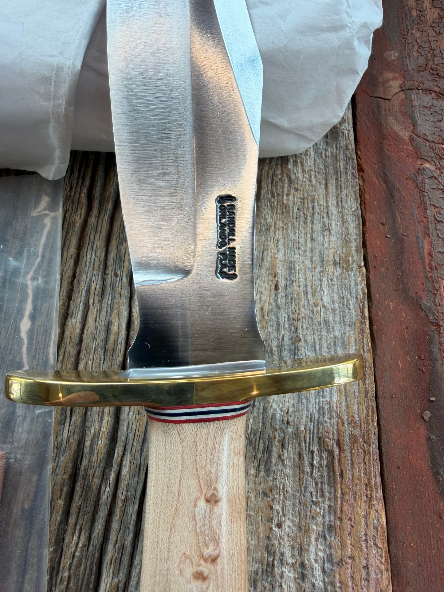 New Paper Randall Made Knife Model 12-8 supplied Maple handle, carbon  blade, brass hilt and rounded butt cap. Red white and blue spacers