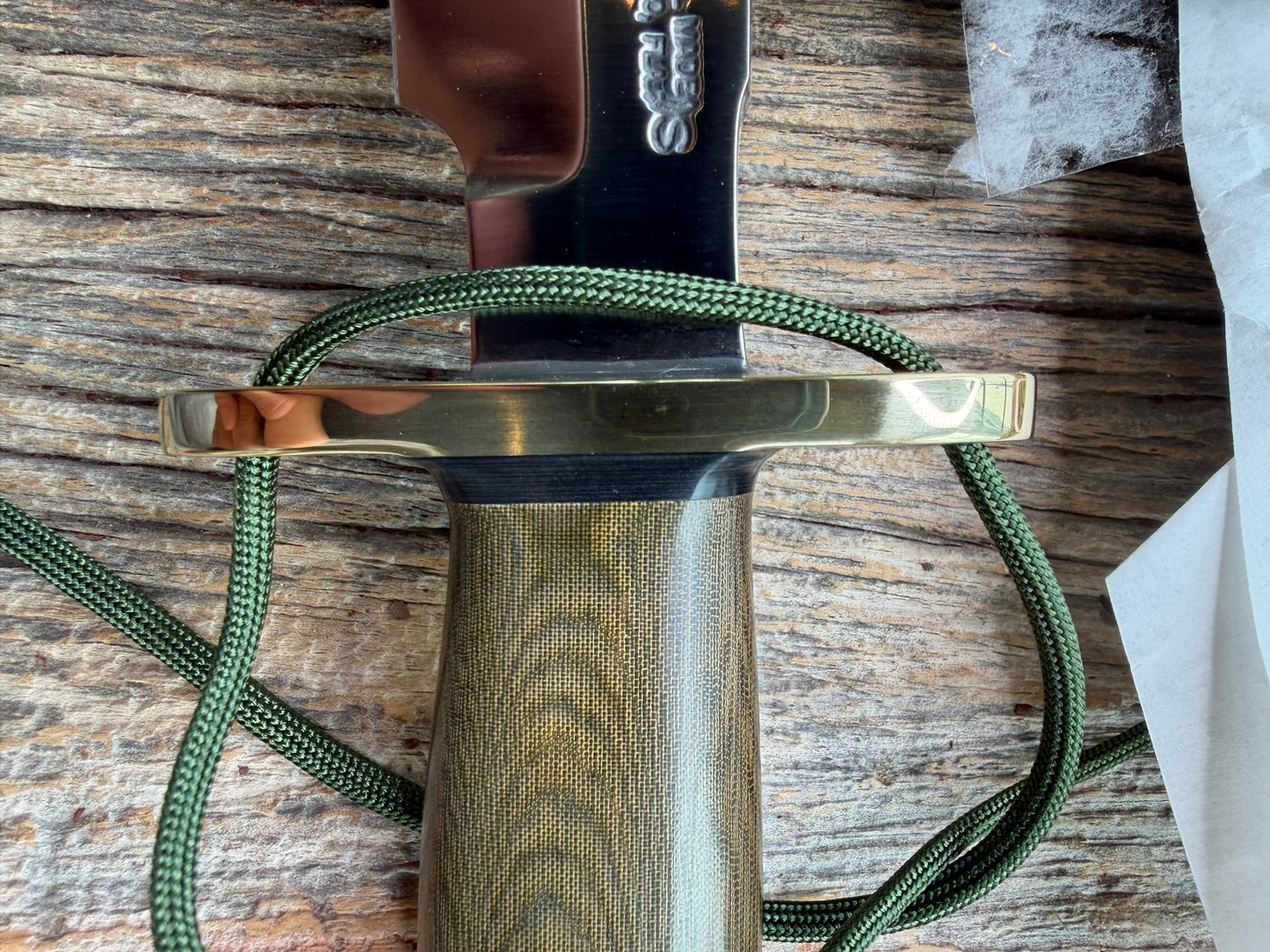 New in Paper Randall Made Knife Model 1-7 Green Micarta handle, Stainless, brass Double Hilt, Brass Crows beak butt cap, lanyard, Sawteeth, single black spacer…loaded!!