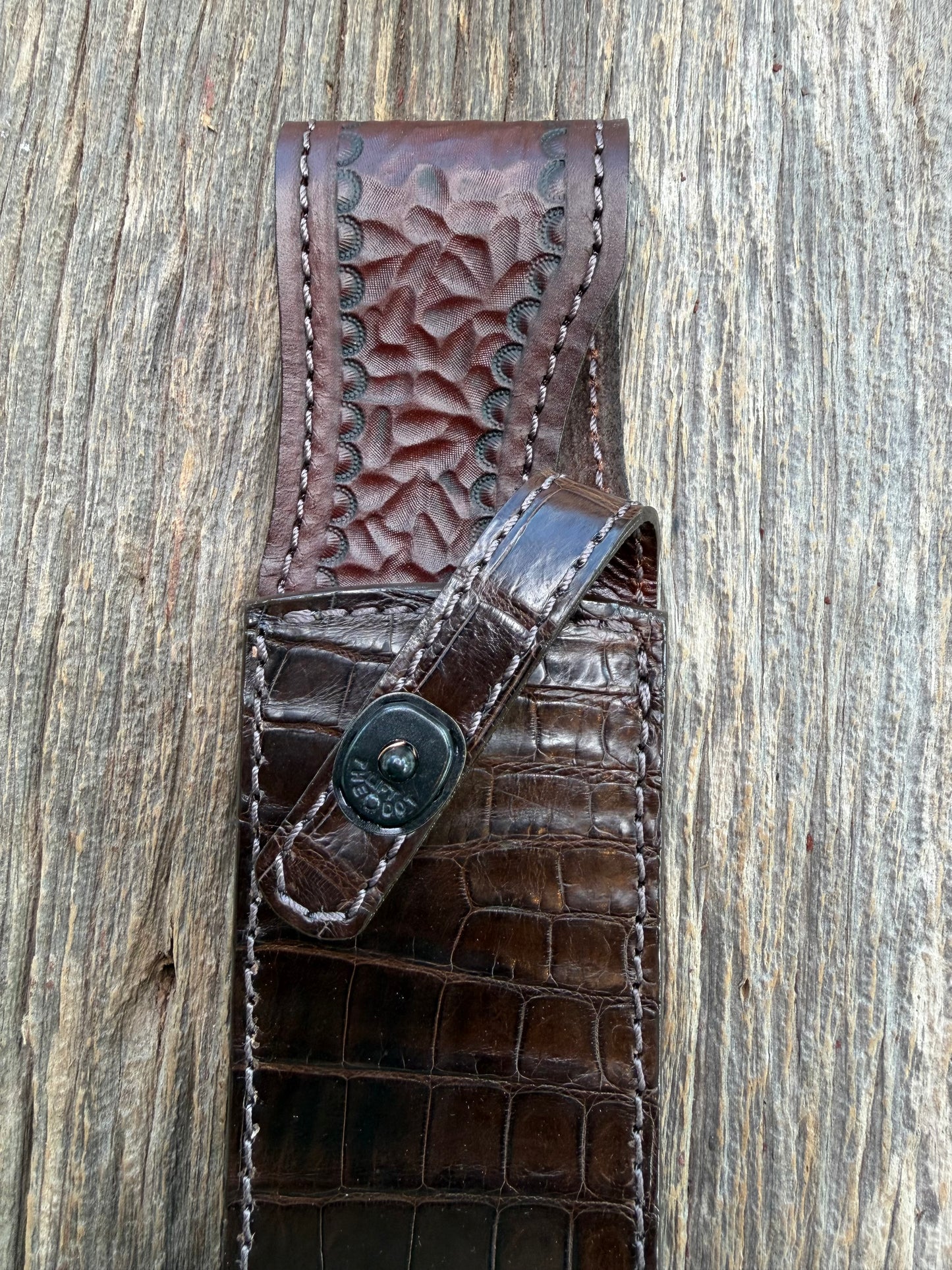 New Randall Model 12-9/14 Grind  Sheath in Exotic Chocolate Brown Matte Crocodile from Treeman with the newest Black Canteen snap. Killer sheath.