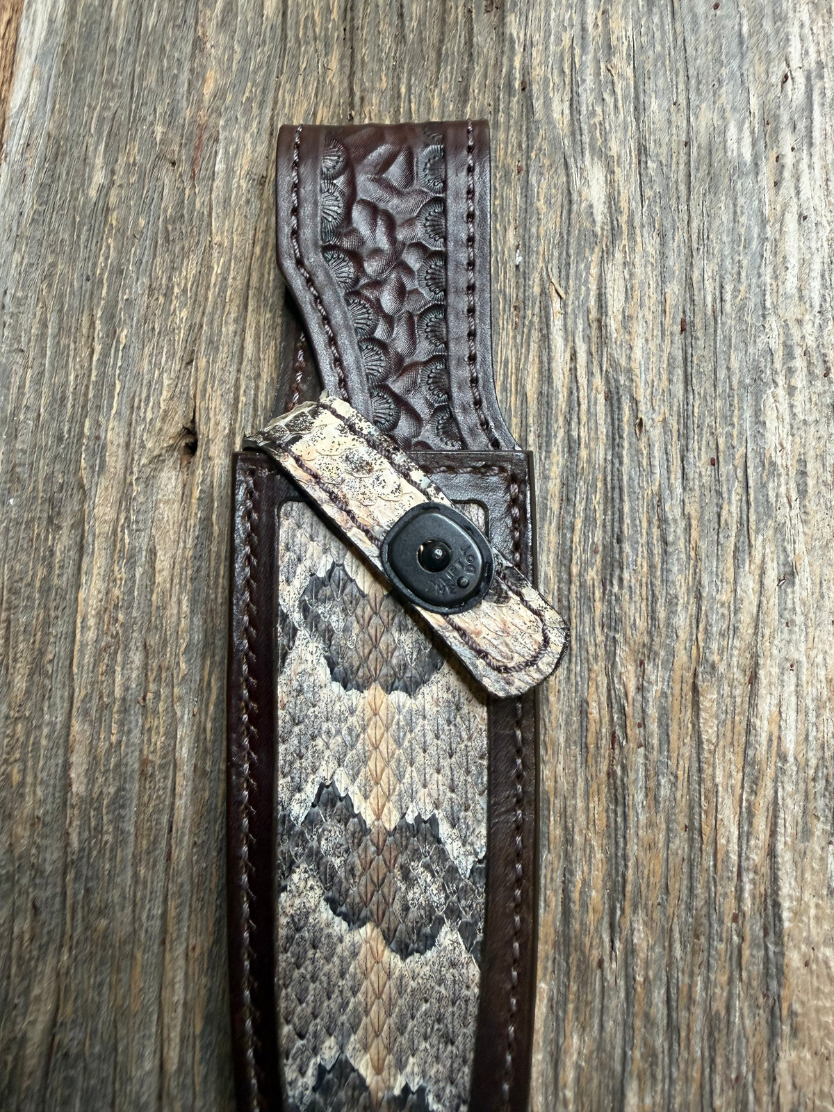Randall Model 25-6 sheath with a Canebrake RattleSnake skin from Treeman Sheaths. Vibrant colors and along side Copperheads the hardest skin to source.
