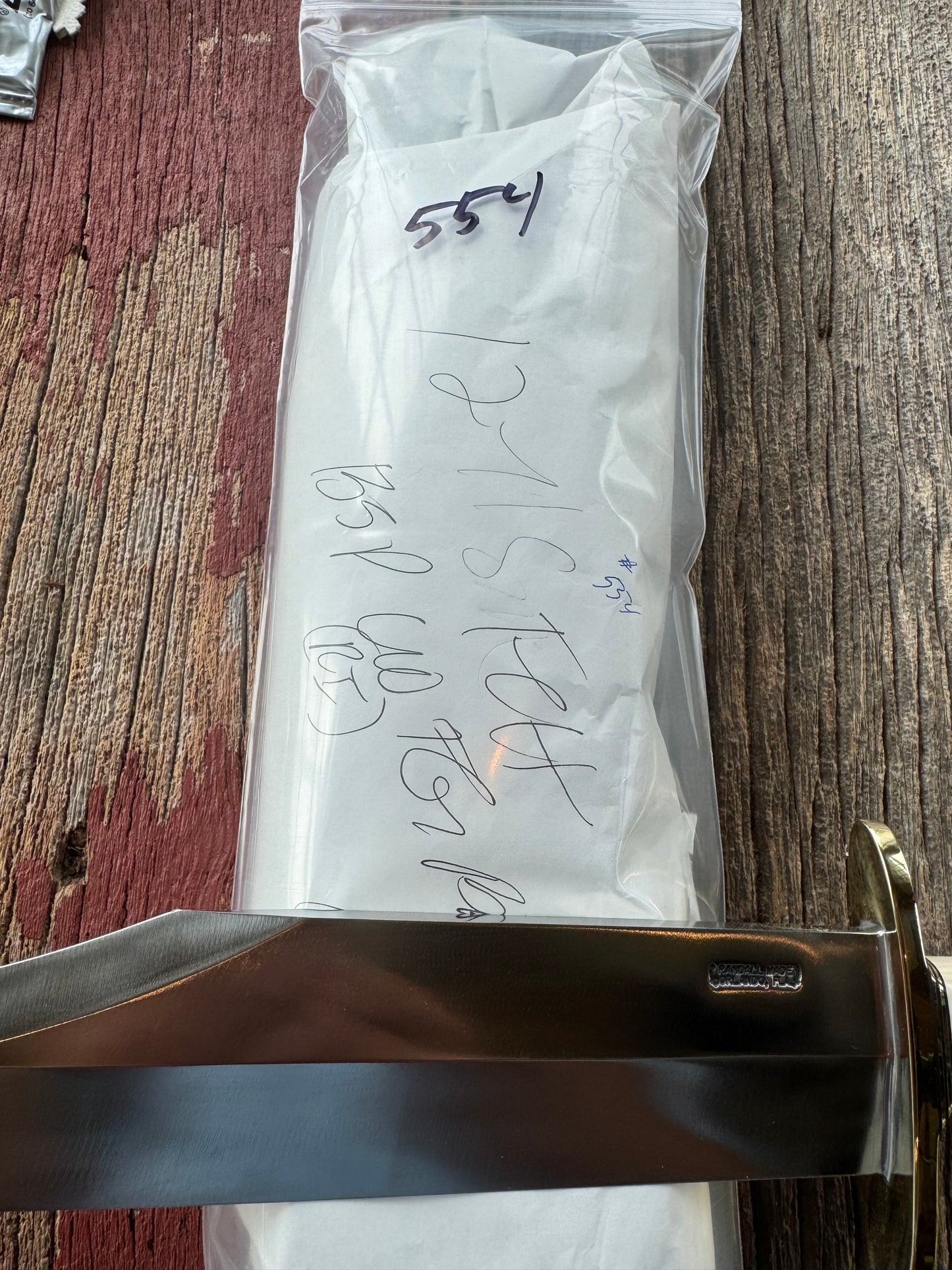 New in Paper Model 12-11 Smithsonian “Smitty” Bowie. Beautiful Dave Warthers Resin with a finger grooves grip and a Brass forward curved hilt and brass butt cap.