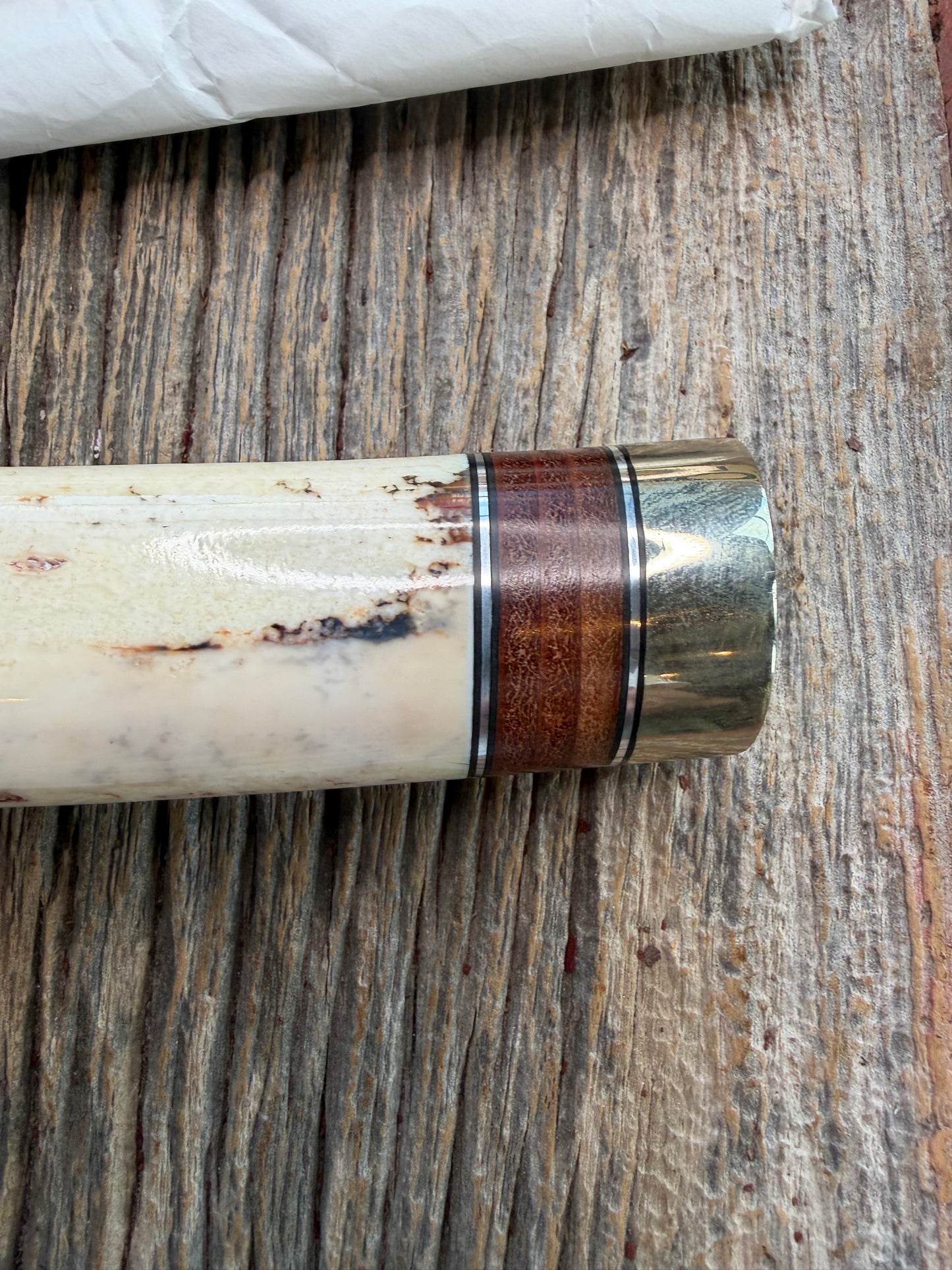 New in Paper Randall Model 12-9 Fossil Walrus Ivory and 25 style stacked Leather grip. Double Nickel Silver hilt and nickel butt cap.