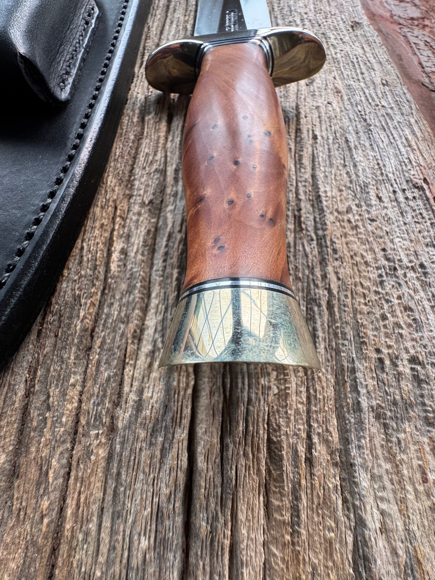 Like new Randall Model 2-8 Stainless steel blade, Nickel silver hilt and butt cap. Black leather sheath. Thuya wood handle.