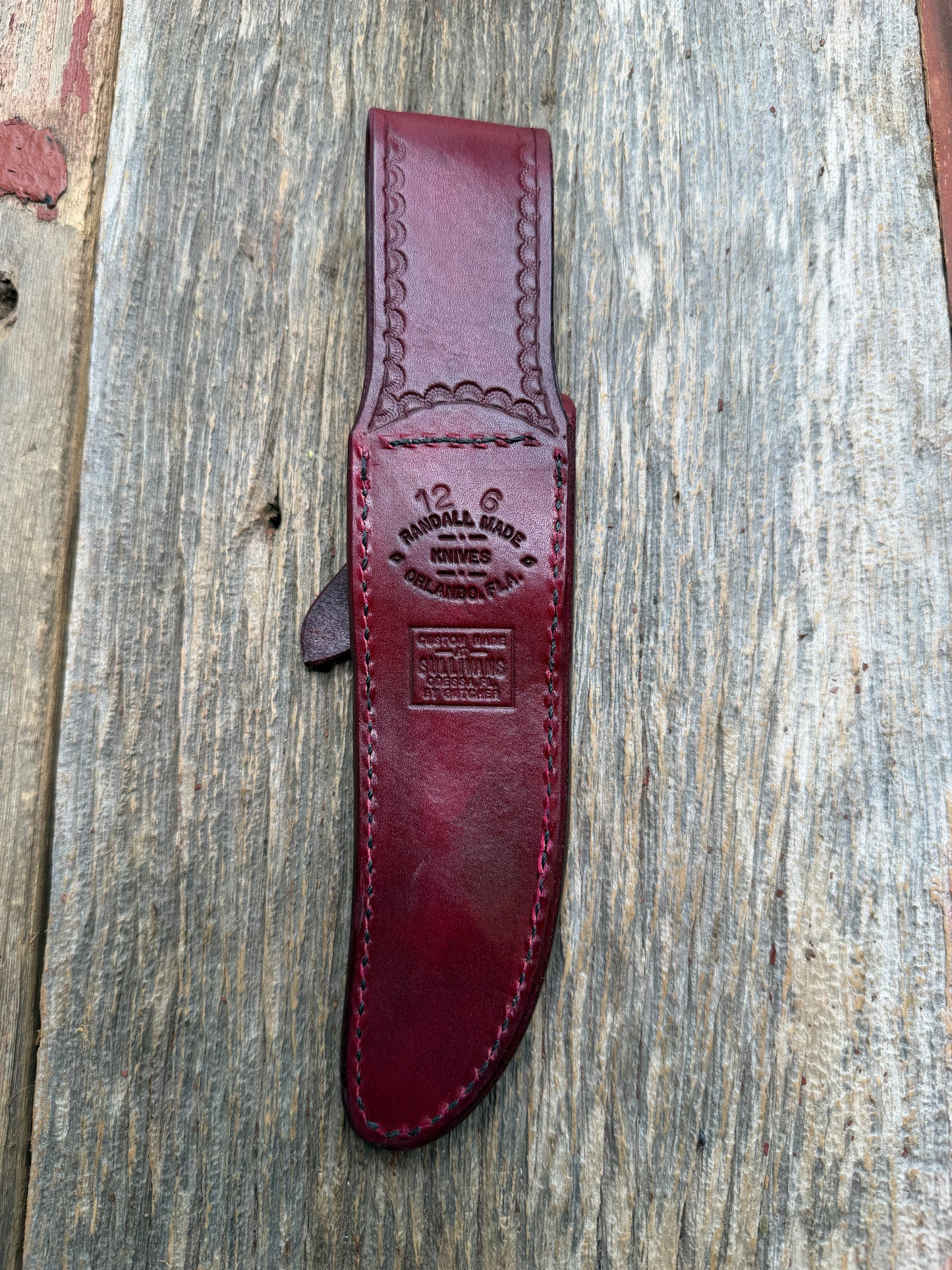 Randall Model 12-6 sheath in Ox Blood Red stamped leather from Sullivans by Gutcher. Parquet window pattern, mesmerizing !!