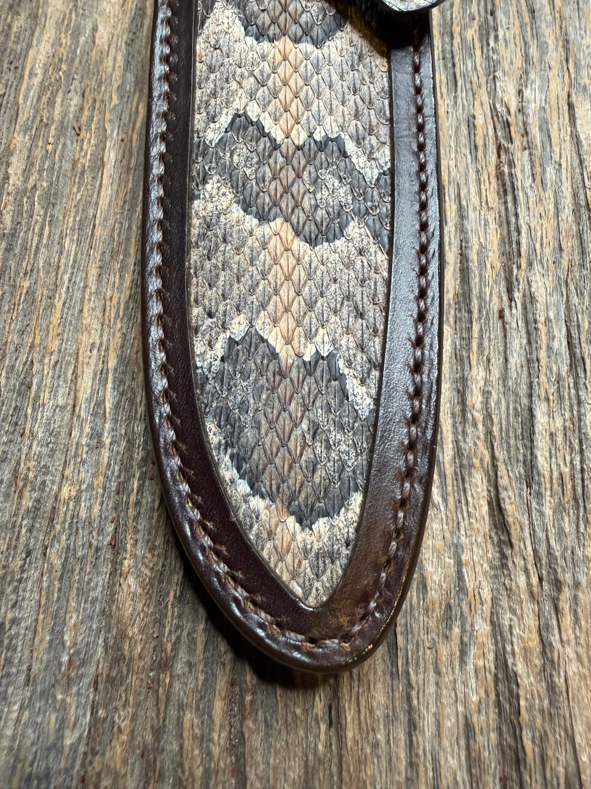 Randall Model 25-6 sheath with a Canebrake RattleSnake skin from Treeman Sheaths. Vibrant colors and along side Copperheads the hardest skin to source.