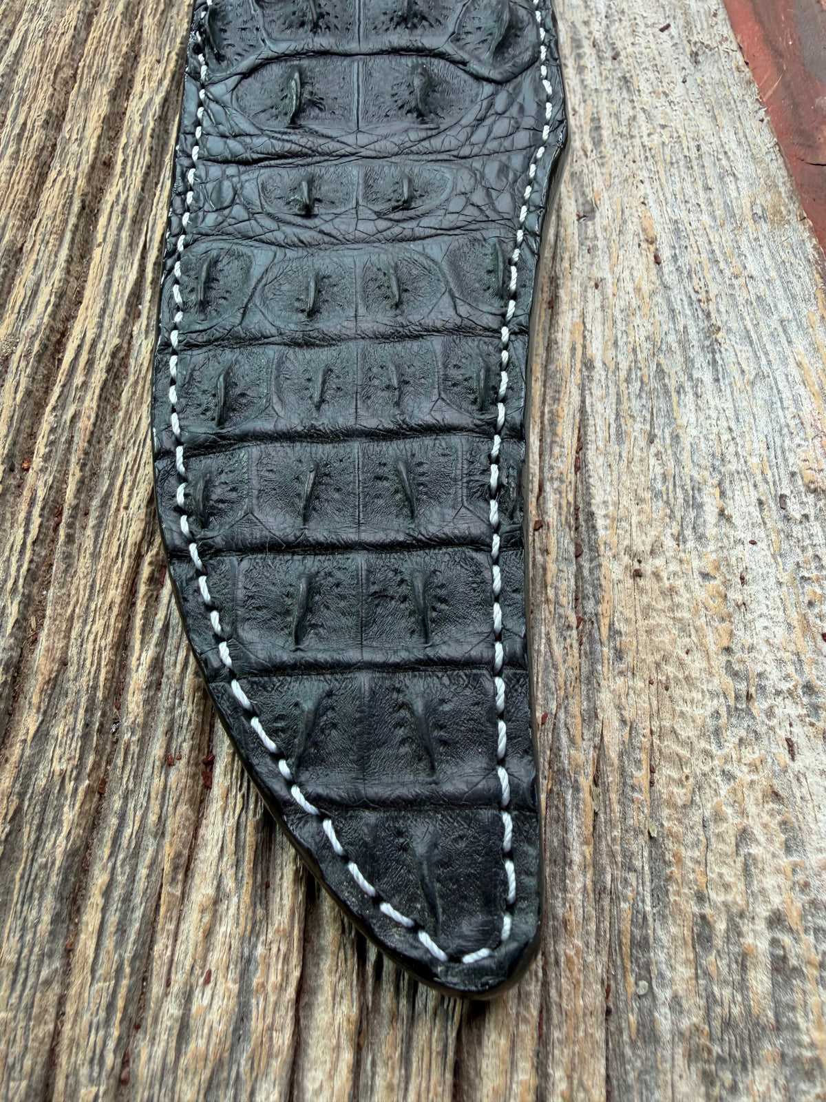New Randall Model 12-8 Sheath in Exotic Black Matte Crocodile skull from Treeman with a Black Canteen snap. White thread deviated stitching on black leather..Killer sheath.