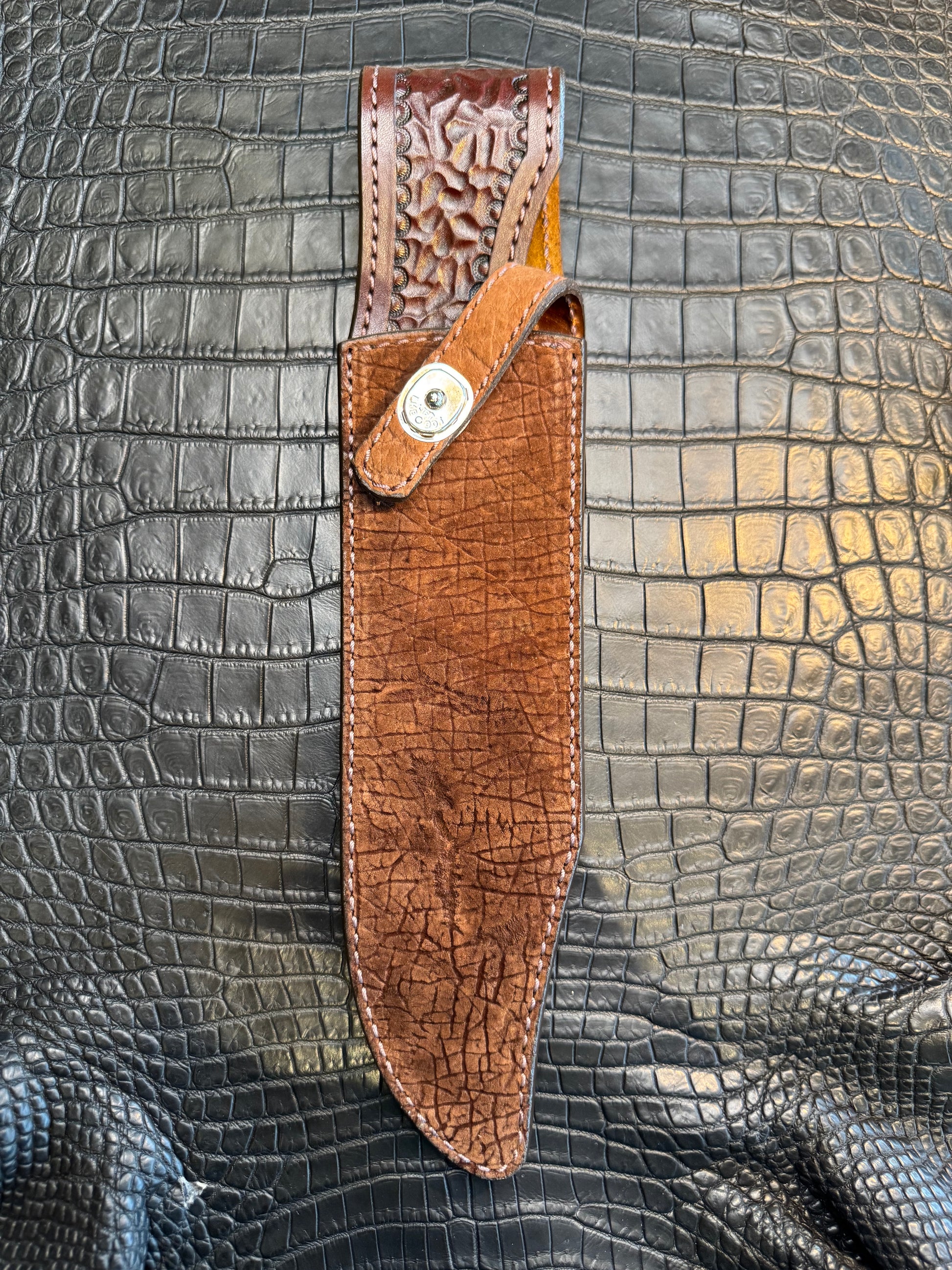 Randall Model 12-9 Bowie Clip Point in Chocolate Hippo, forward curved hilt, Canteen Snap, full brass stamping and stitching.