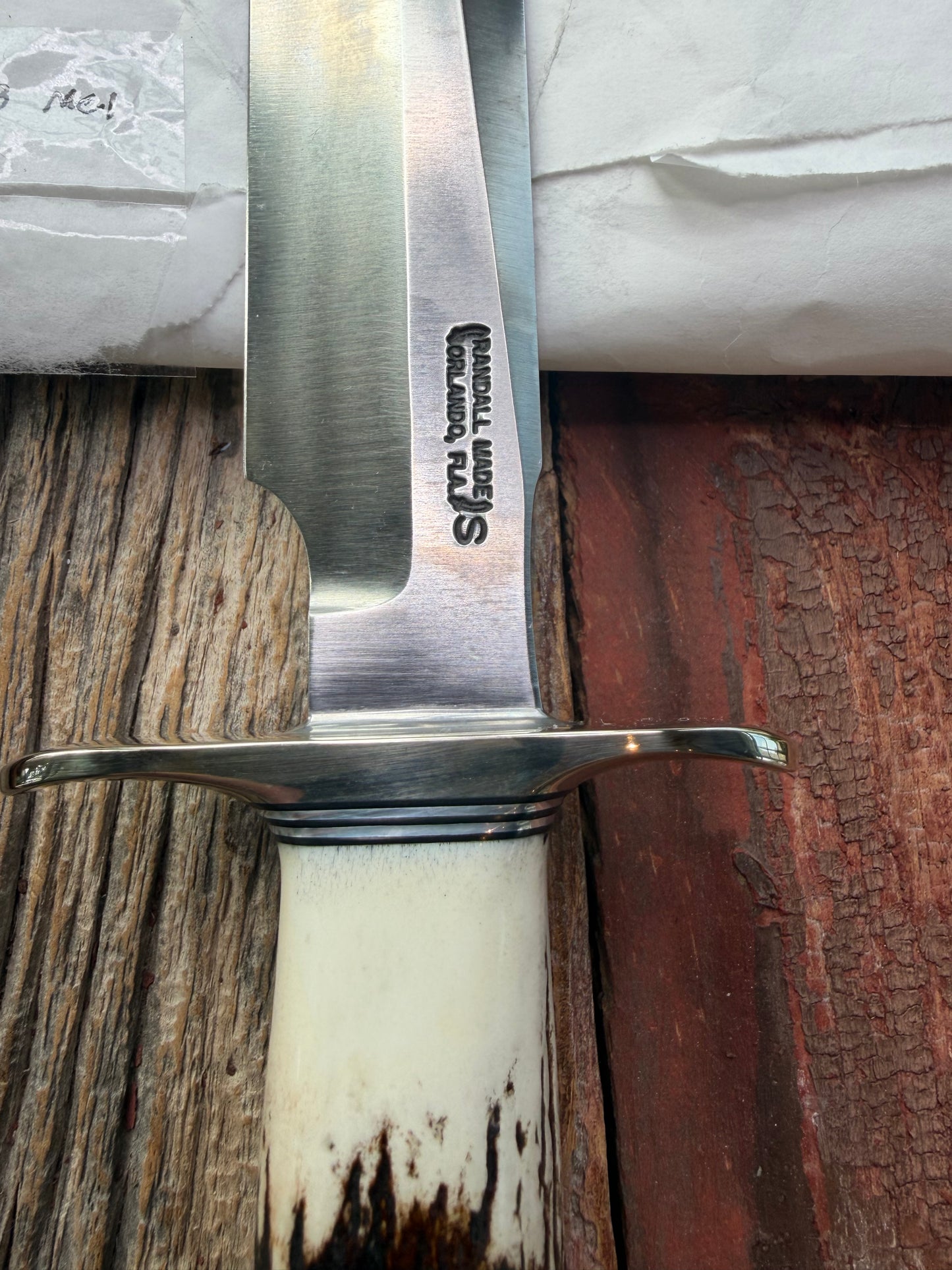 New in Paper Randall Made Knife Model 1-8 Stag , Stainless, Black and Aluminum spacers, Nickel Silver Hilt, Aluminum butt cap.