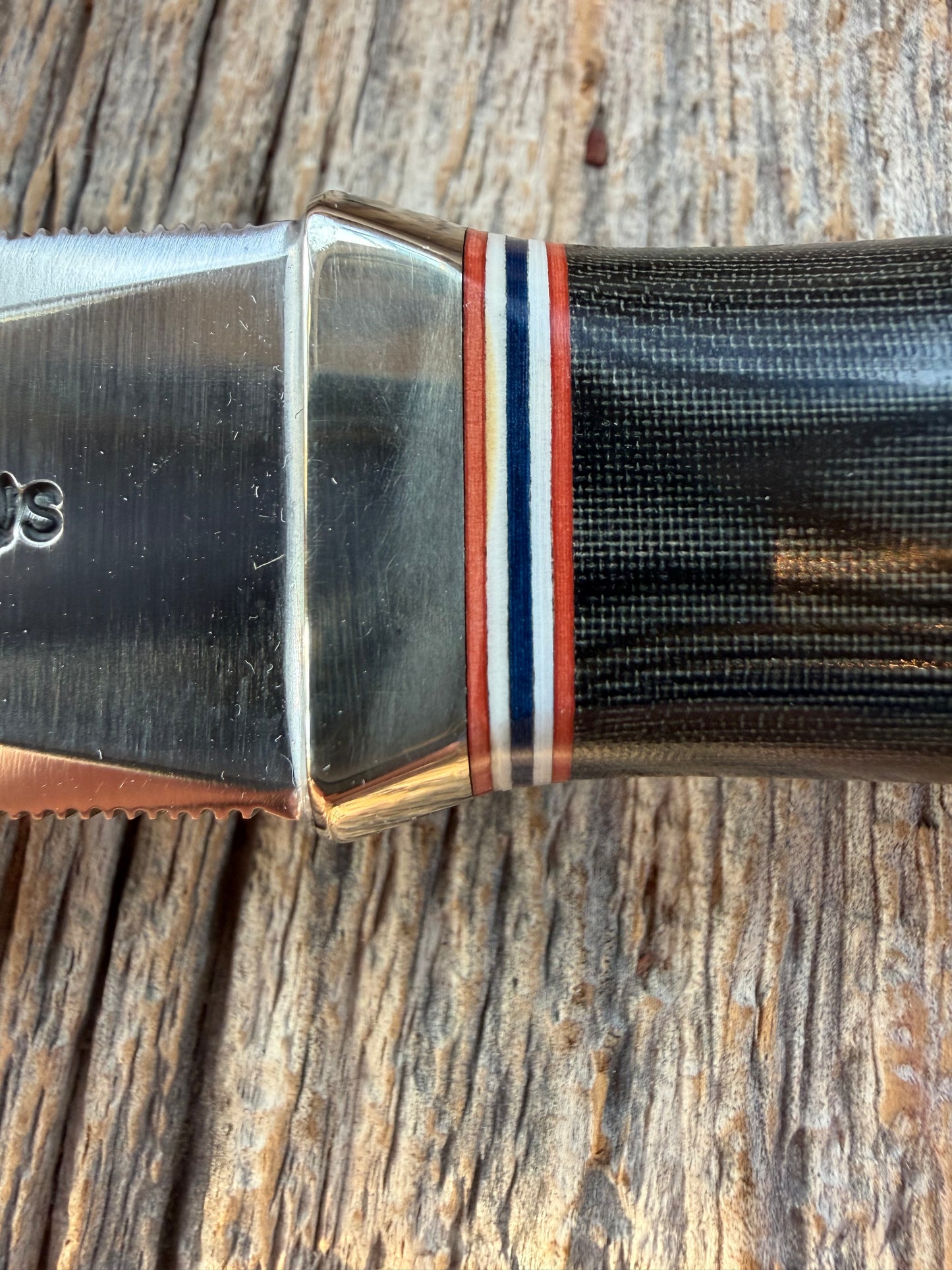 New in Paper Randall Model 24 Guardian in Black Micarta Nickel hilt, Stainless, red white blue spacers.