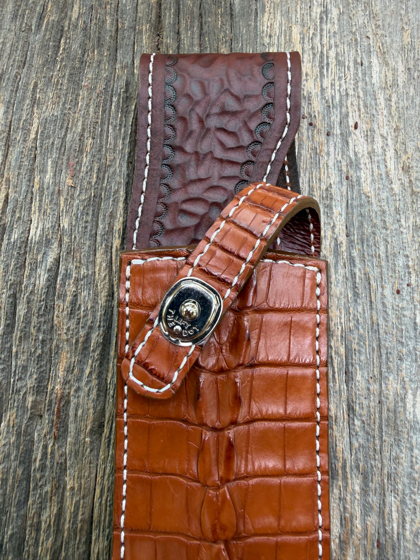 New Randall Model 12-11 Confederate Sheath in Exotic thick and textured Honey Crocodile skin ( tail portion) on brown leather from Treeman with a silver Canteen snap. Hand tooled belt loop. Killer sheath.