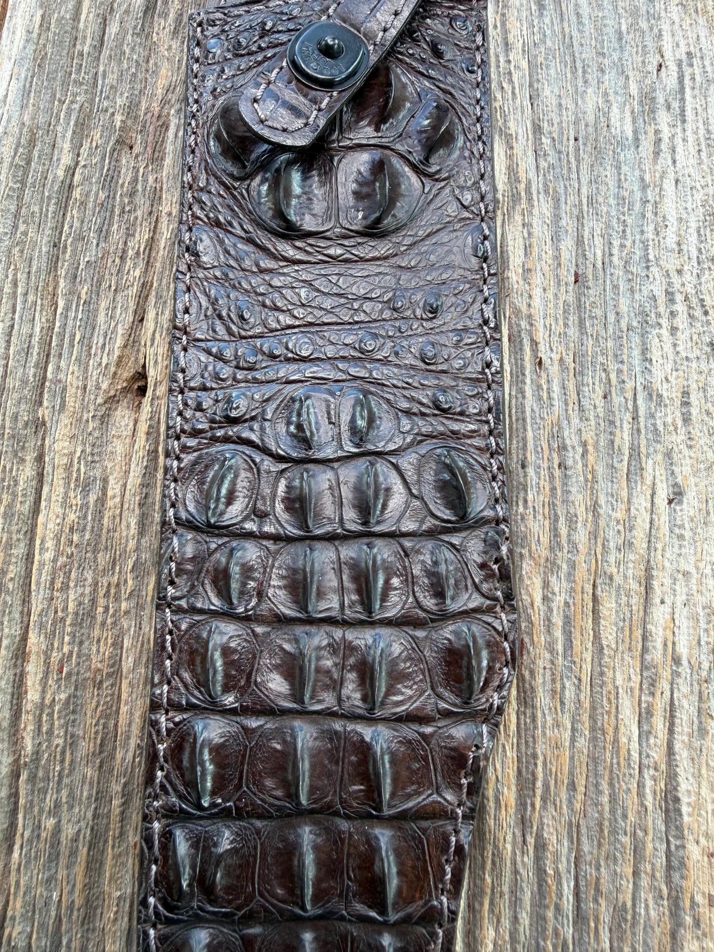 New Randall Model 12-11 Smitty Sheath in Exotic Chocolate Brown Matte Crocodile (Hornback and Skull) from Treeman with the newest Black Canteen snap. Killer sheath.