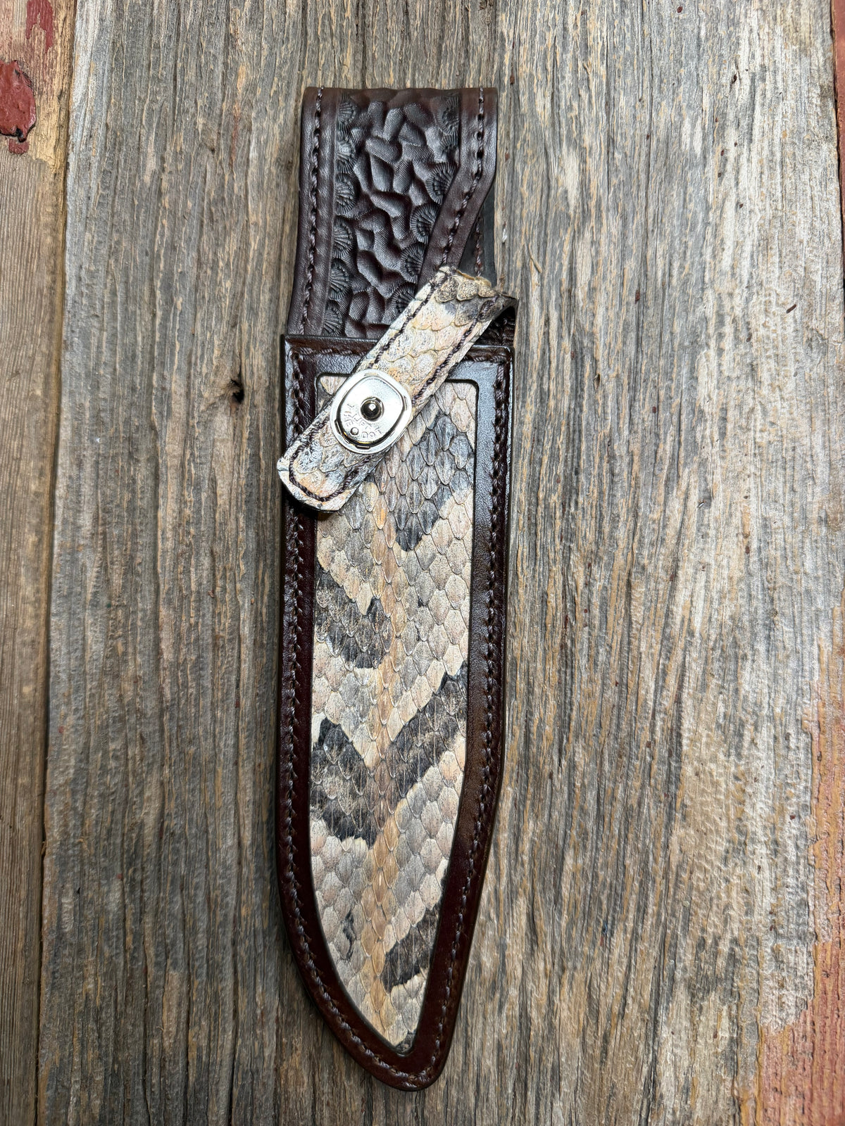 Randall Model 14 sheath with a Canebrake RattleSnake skin from Treeman Sheaths. Vibrant colors and along side Copperheads the hardest skin to source.