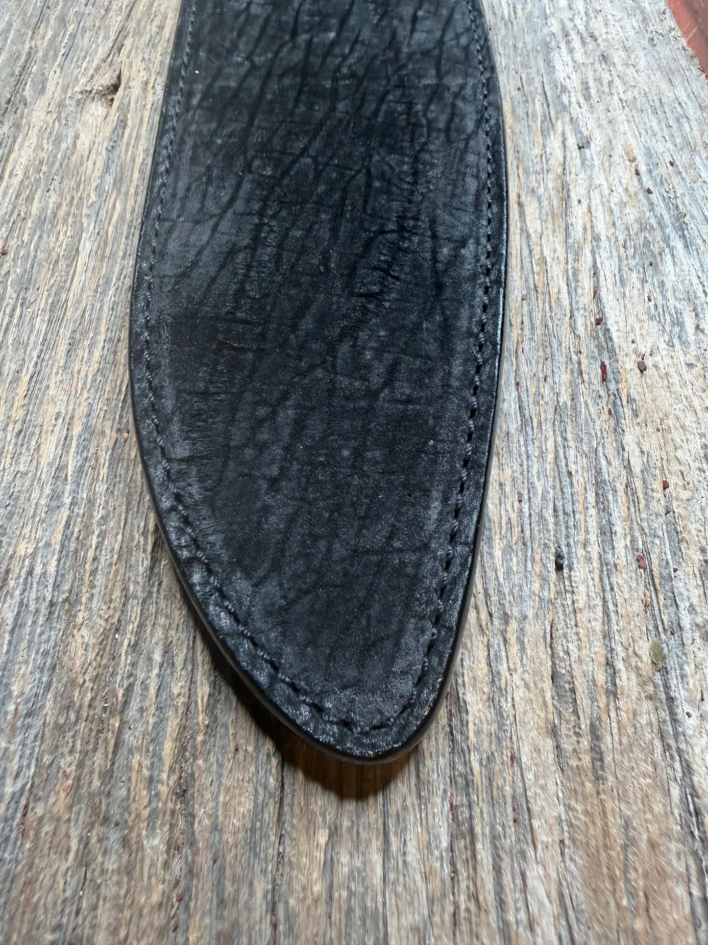 Randall Model 12-11 Large Sasquatch in Black Hippo, forward curved hilt, black Canteen Snap, full brass stamping and stitching.