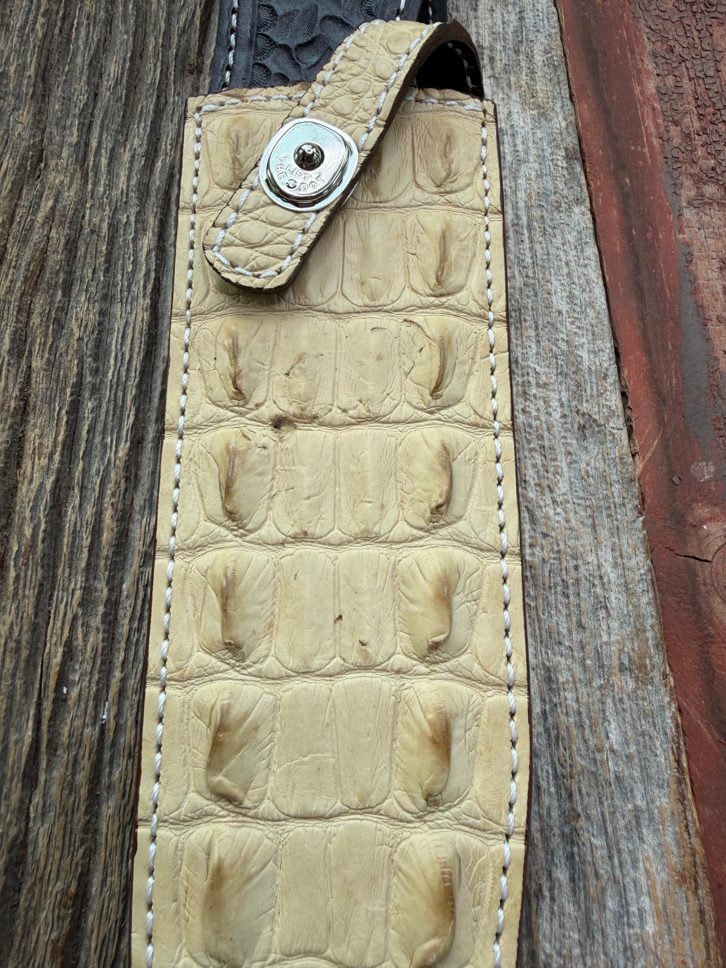 New Randall Model 12-9/14 Grind Sheath in Exotic Ivory Matte Crocodile (tail portion) from Treeman with a silver Canteen snap. Killer sheath.