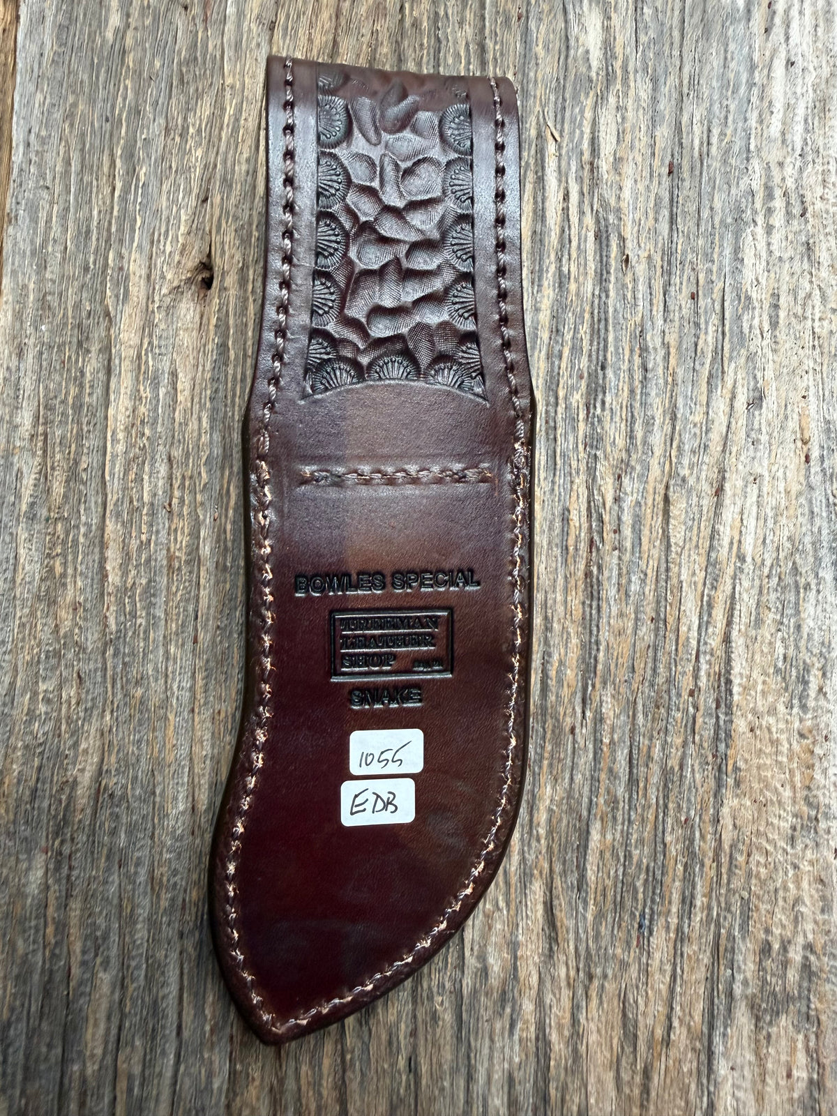 Randall Model Bowles Special sheath with an Eastern Diamondback RattleSnake skin from Treeman Sheaths. Hand tooled belt loop, canteen snap. Vibrant colors and one of the hardest skins to source.
