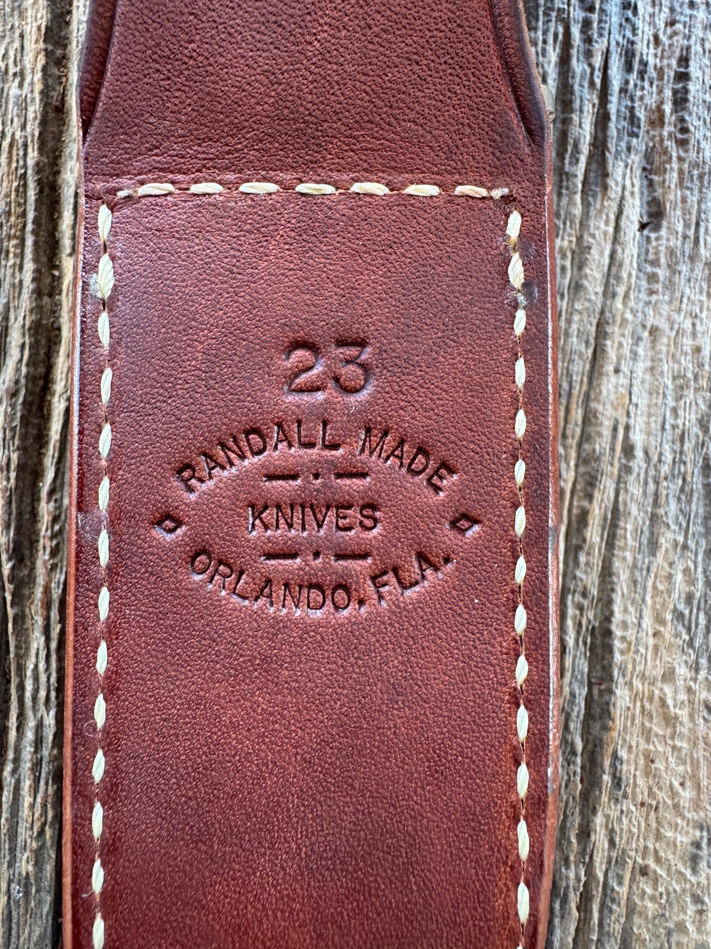 Nice Randall Model 23 Game Master in Stag with finger grooves. Stainless steel blade, Nickel silver Single hilt and Brown leather sheath.